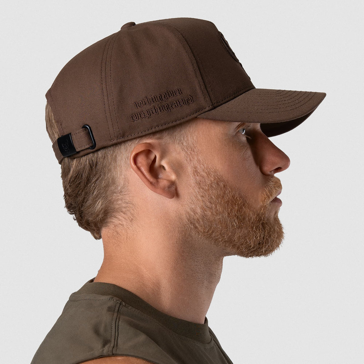 Male model wearing the 5-Panel Initial Hat - Brown right side view