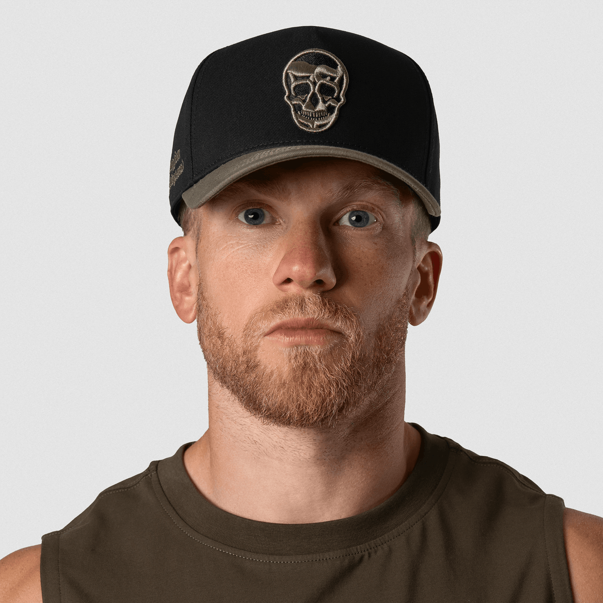 5-Panel Skull Hat in Black/Green – On Model, Front View