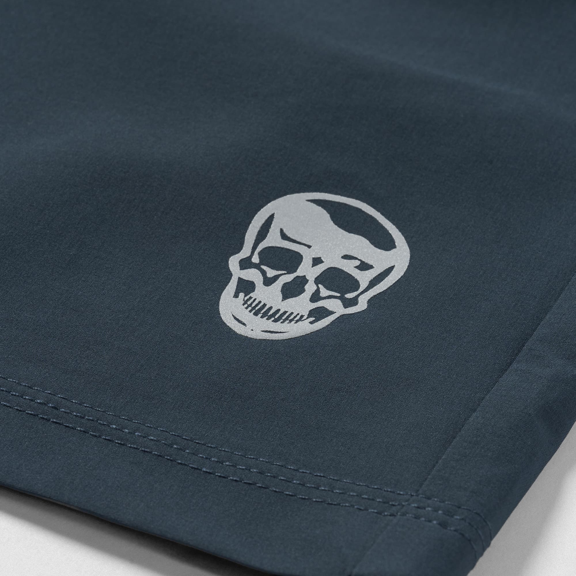 Reflective Gymreapers skull logo detail on Men's Conquer 5 Inch Shorts - Navy