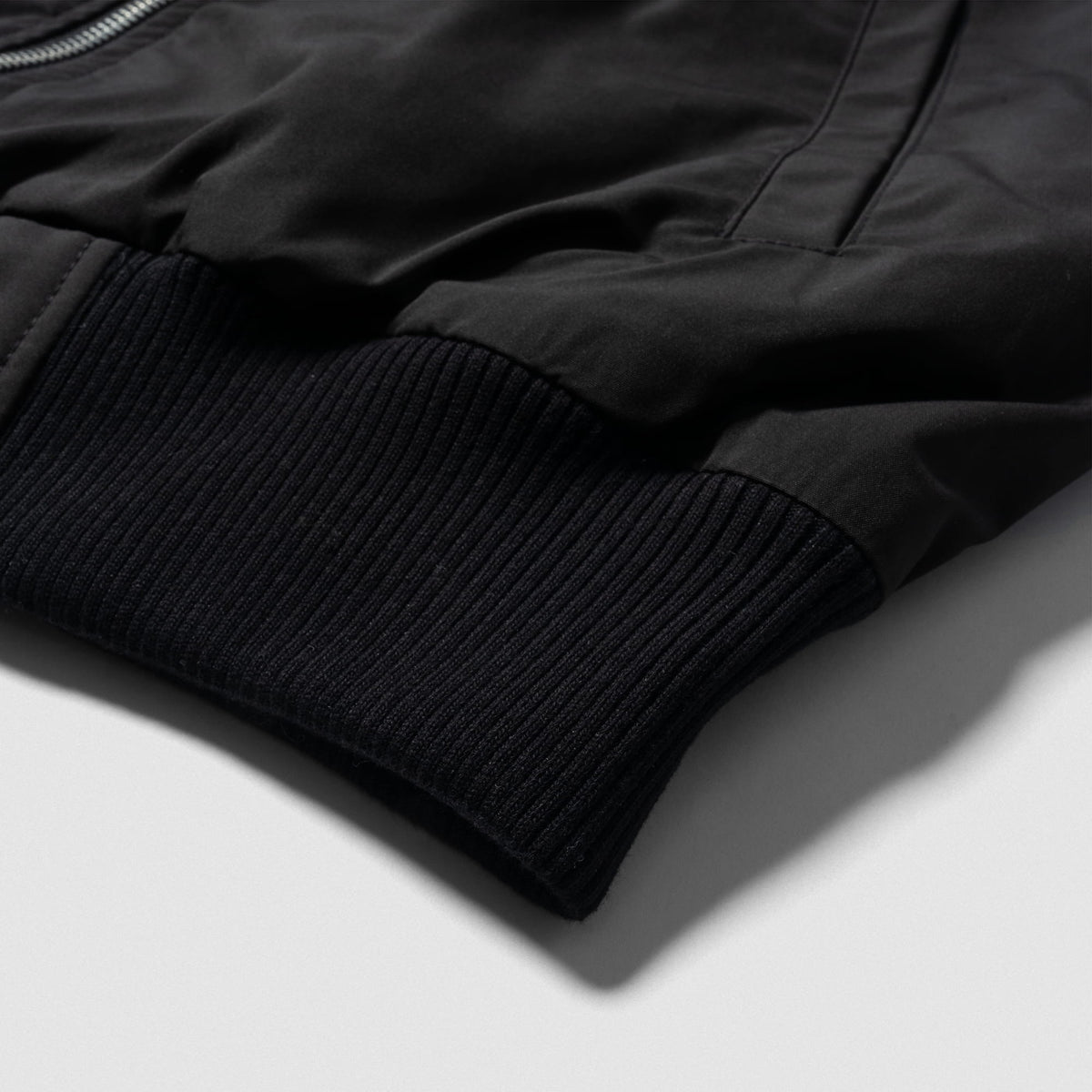 International Division Crop Bomber Jacket | Cuffed bottom hem feature