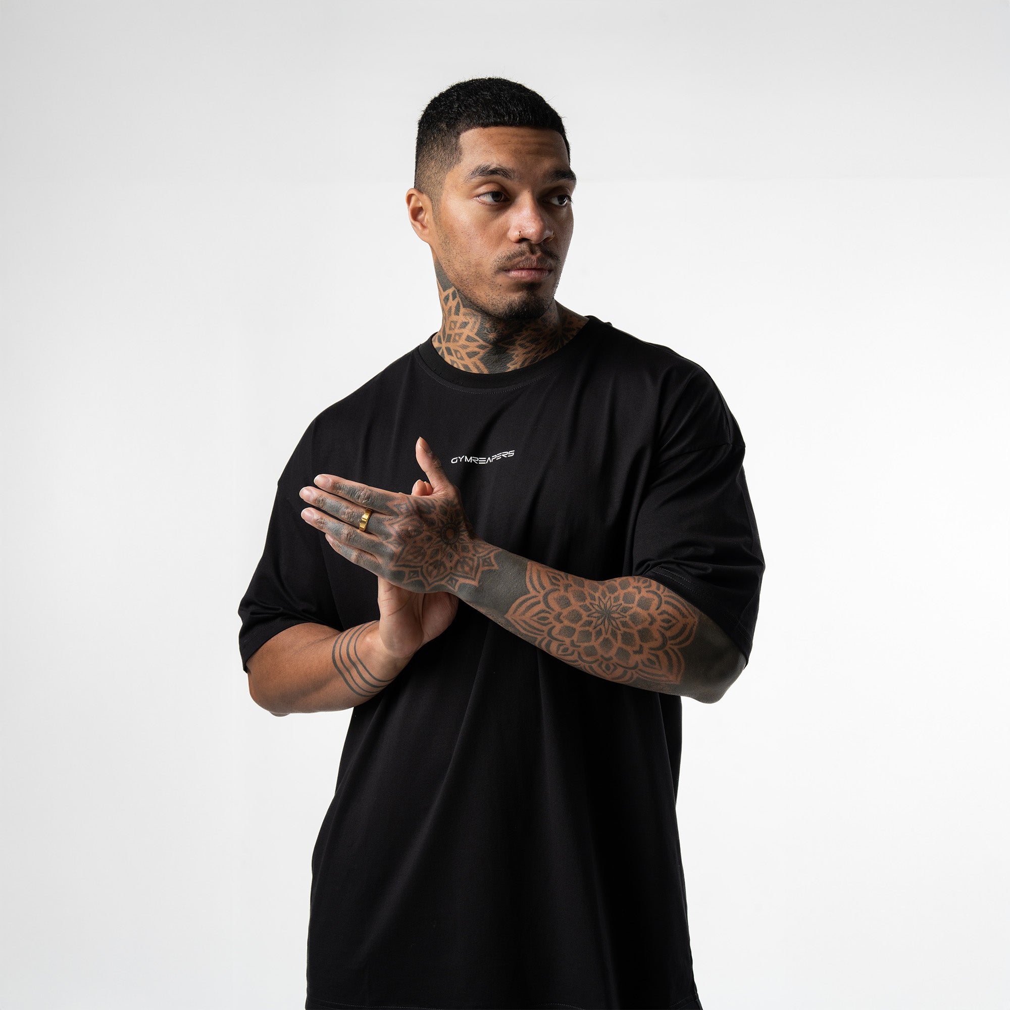 athlete wearing black/white axis box tee front view