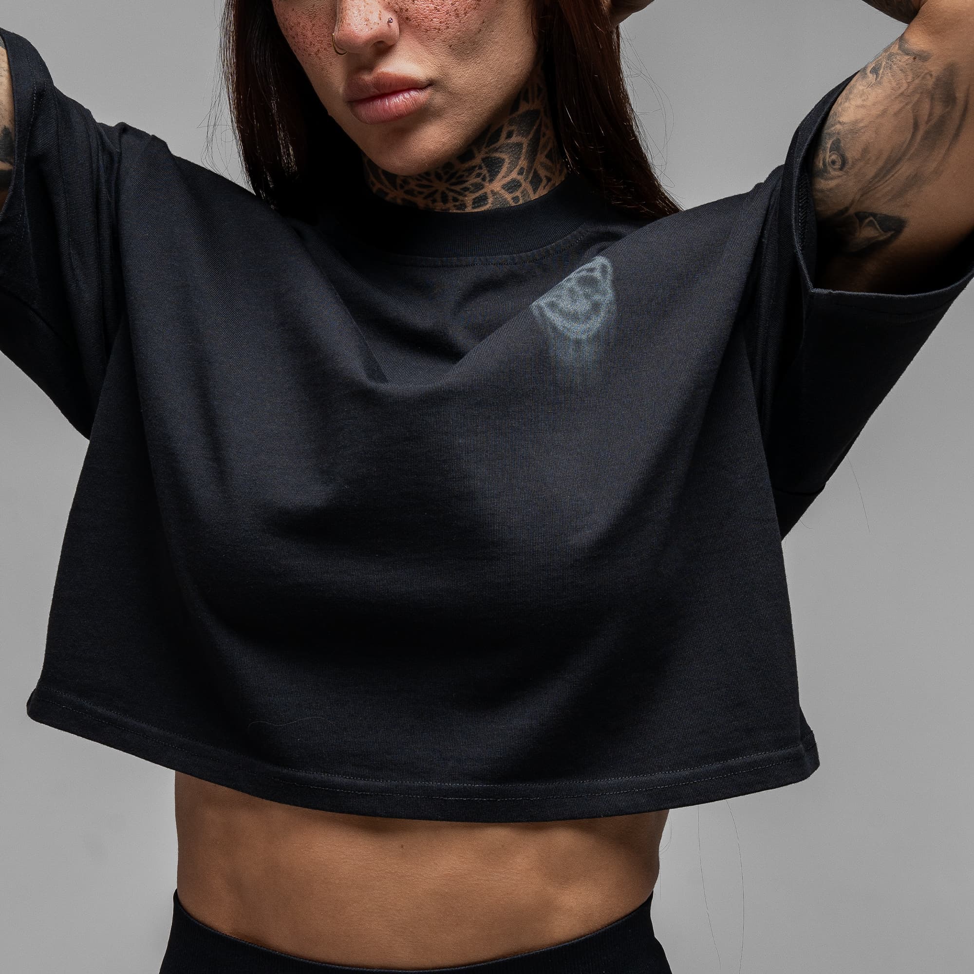 Athlete wearing GR Shadow Cropped Tee close up shot of front side