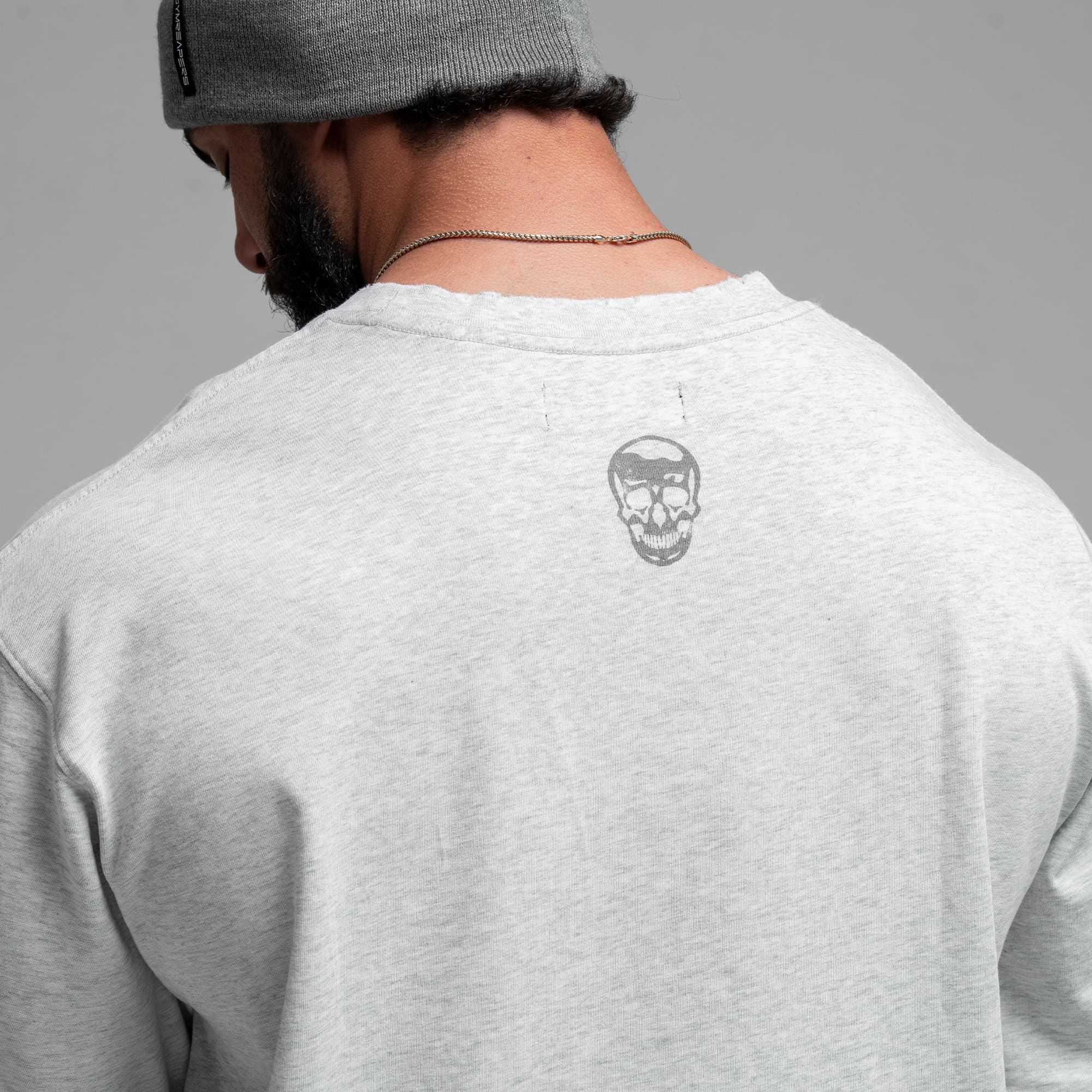 Athlete wearing Reaper Dept. Tee close up shot of back graphic