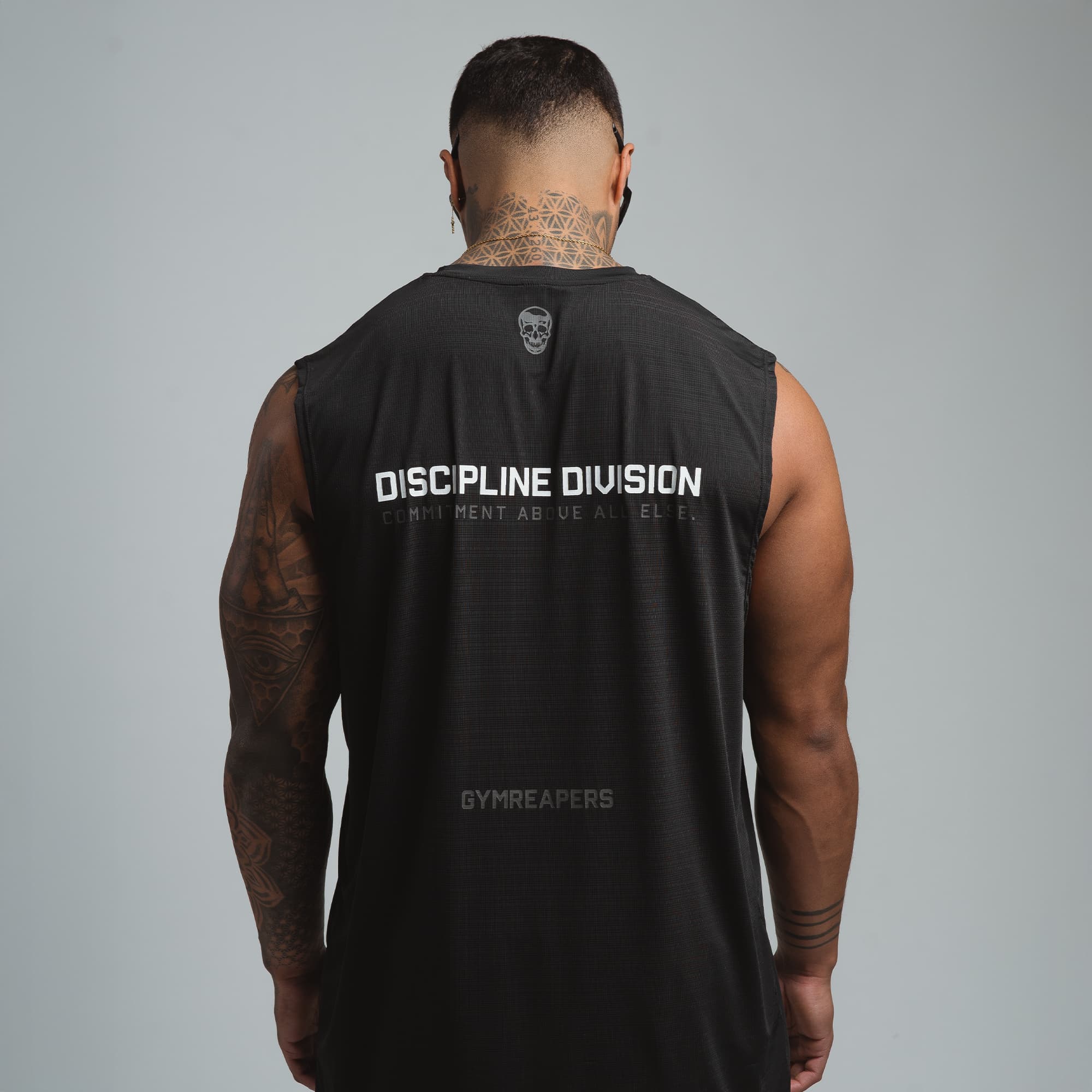 discipline division graphic tank top back full view on athlete