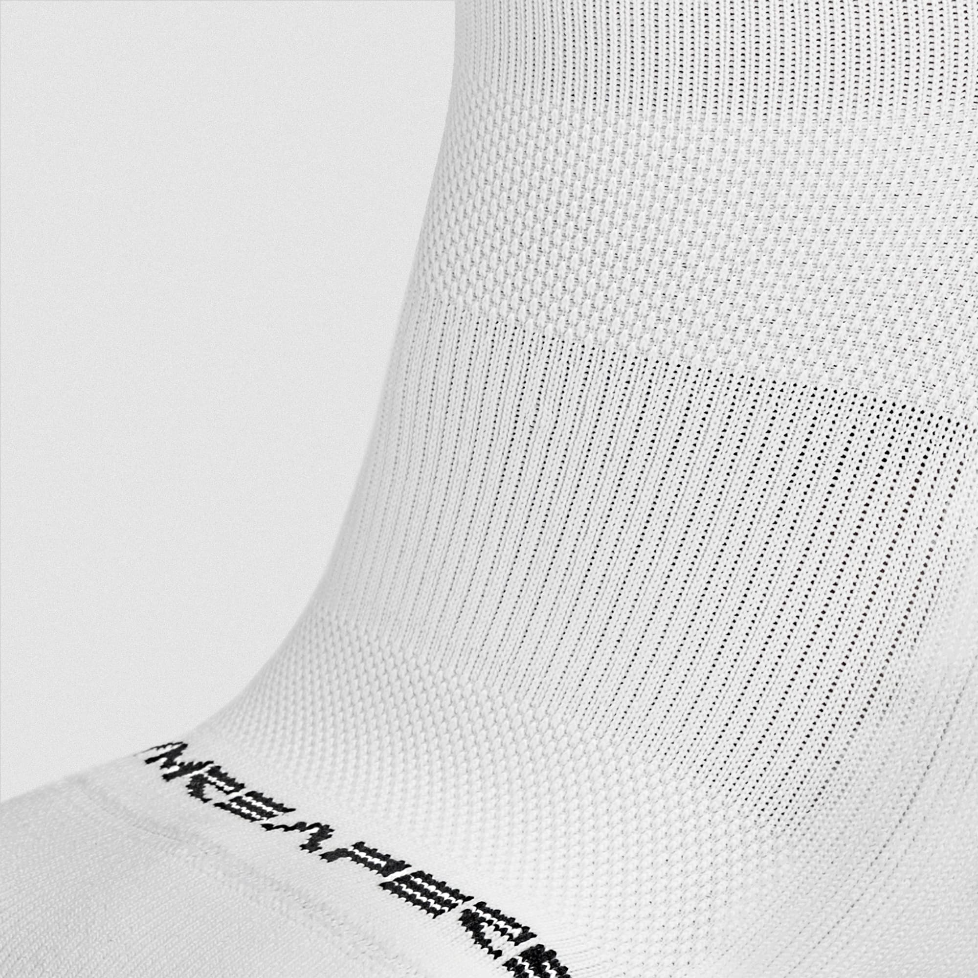 White Stryda™ Crew Run Sock close up shot of fabric detail