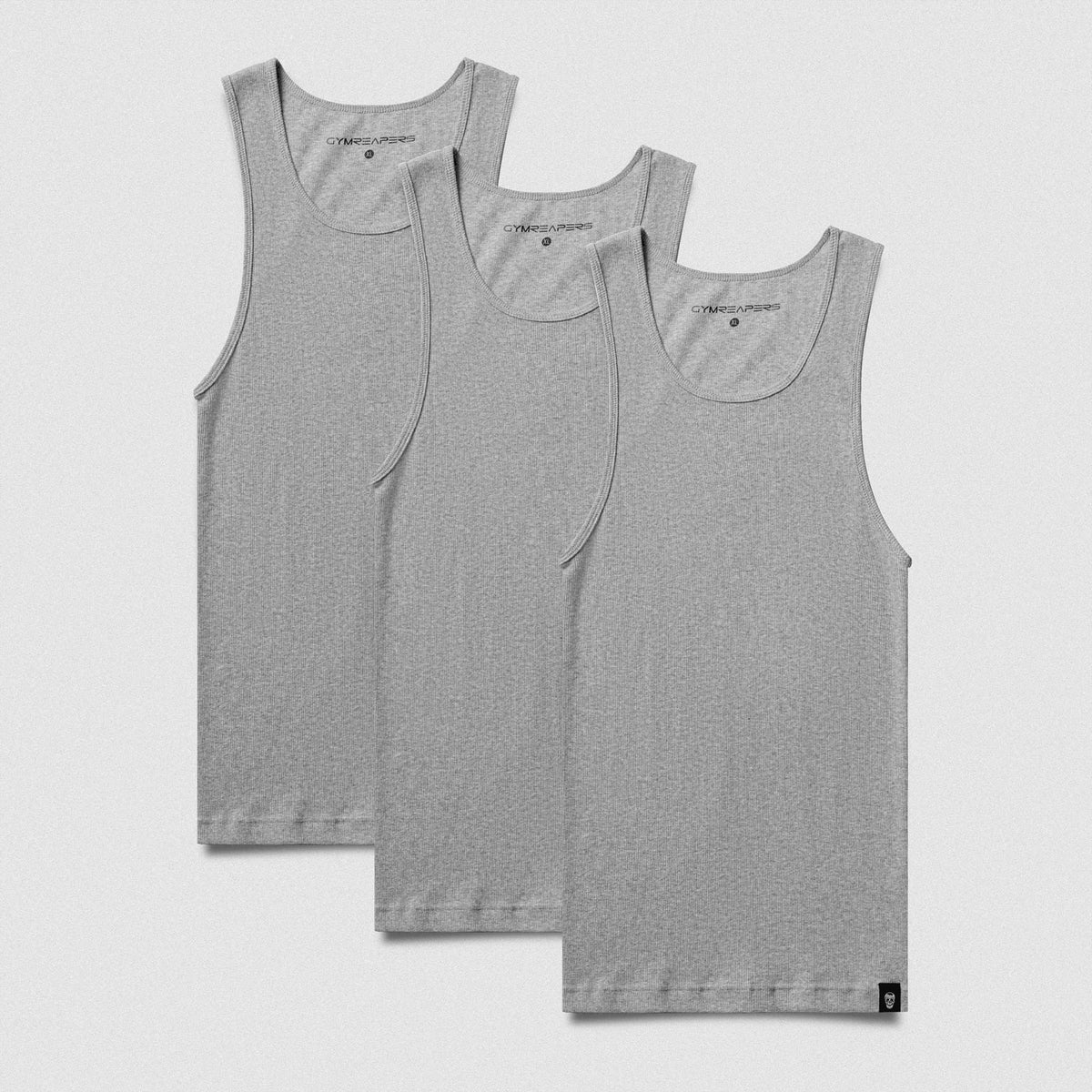 Three heather gray sleeveless tank tops arranged in a layered fan layout on a light gray background.