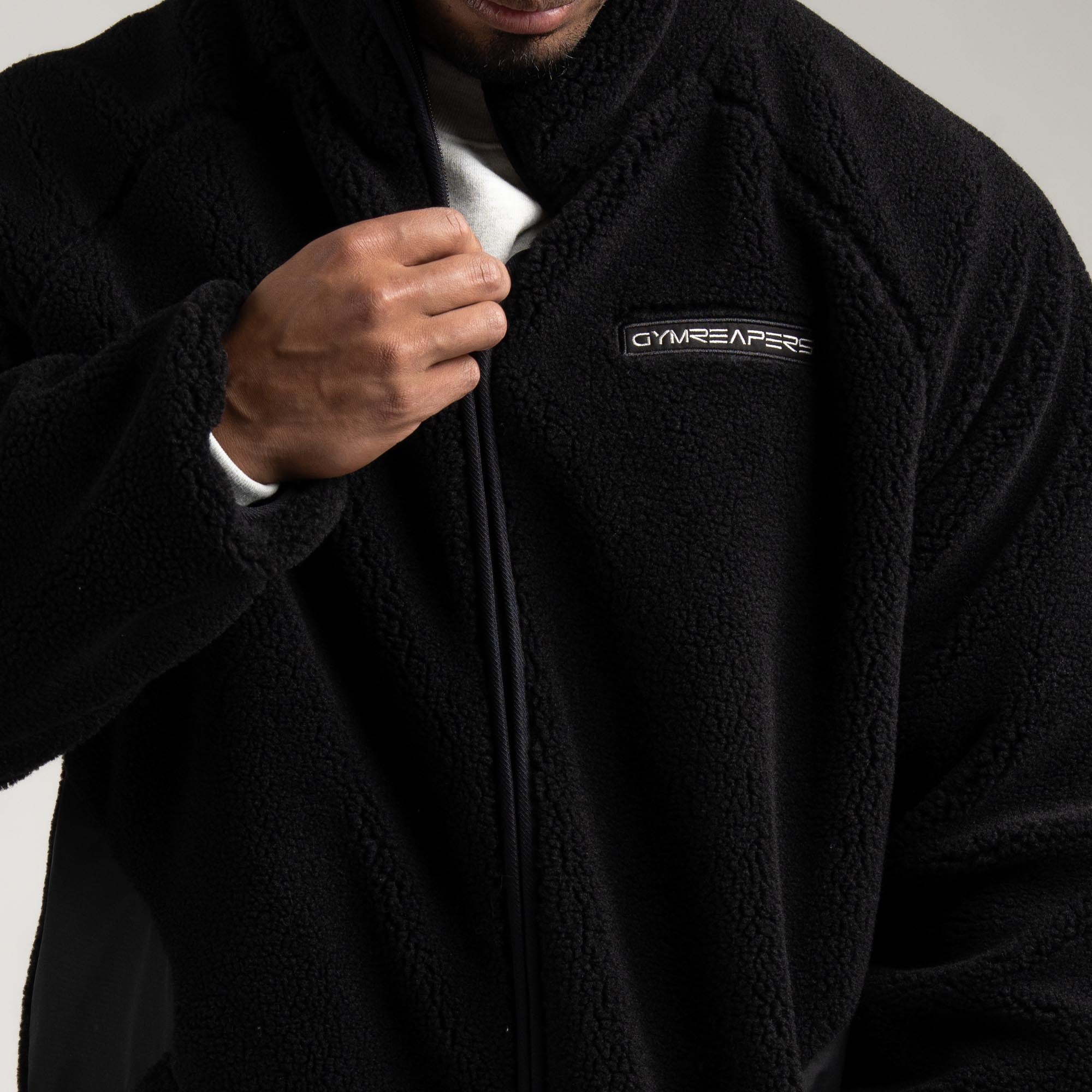 Athlete wearing Sektor Sherpa Jacket close up shot of interior liner