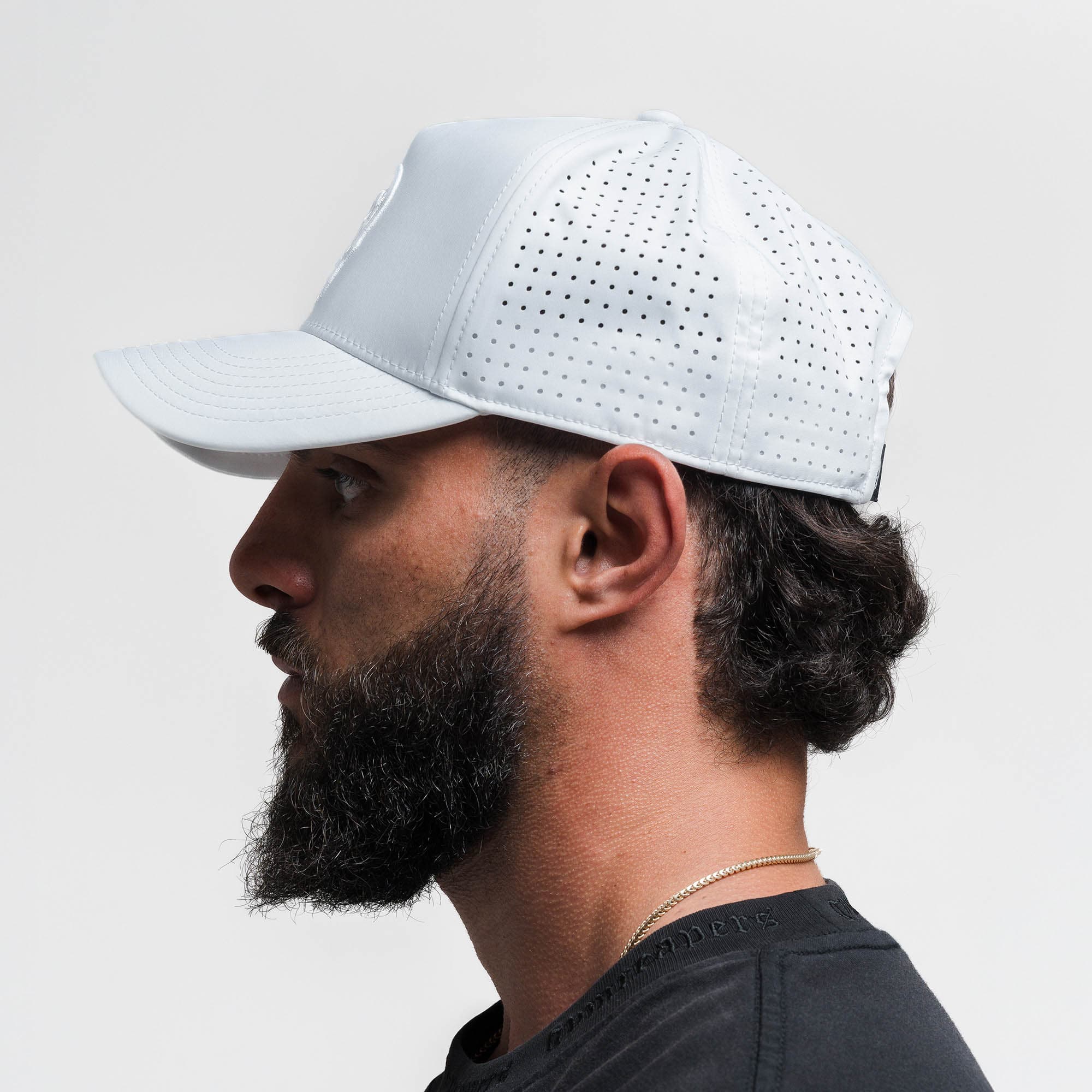 Athlete wearing Hybrid Performance 5-Panel Hat - White/White side view