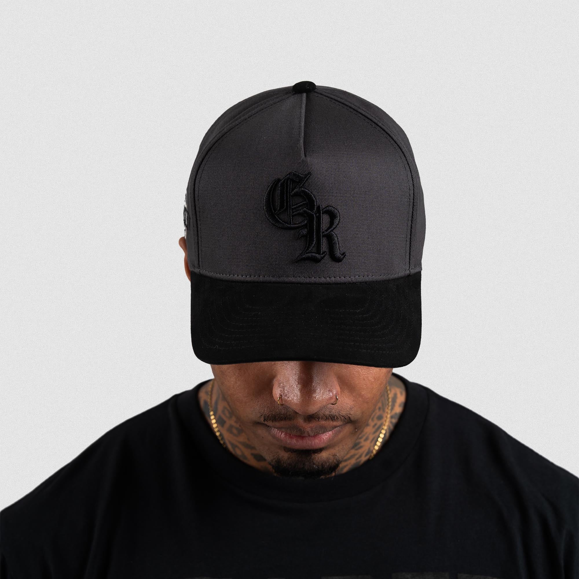 Athlete wearing Gray 5-Panel Initial Suede Hat front view