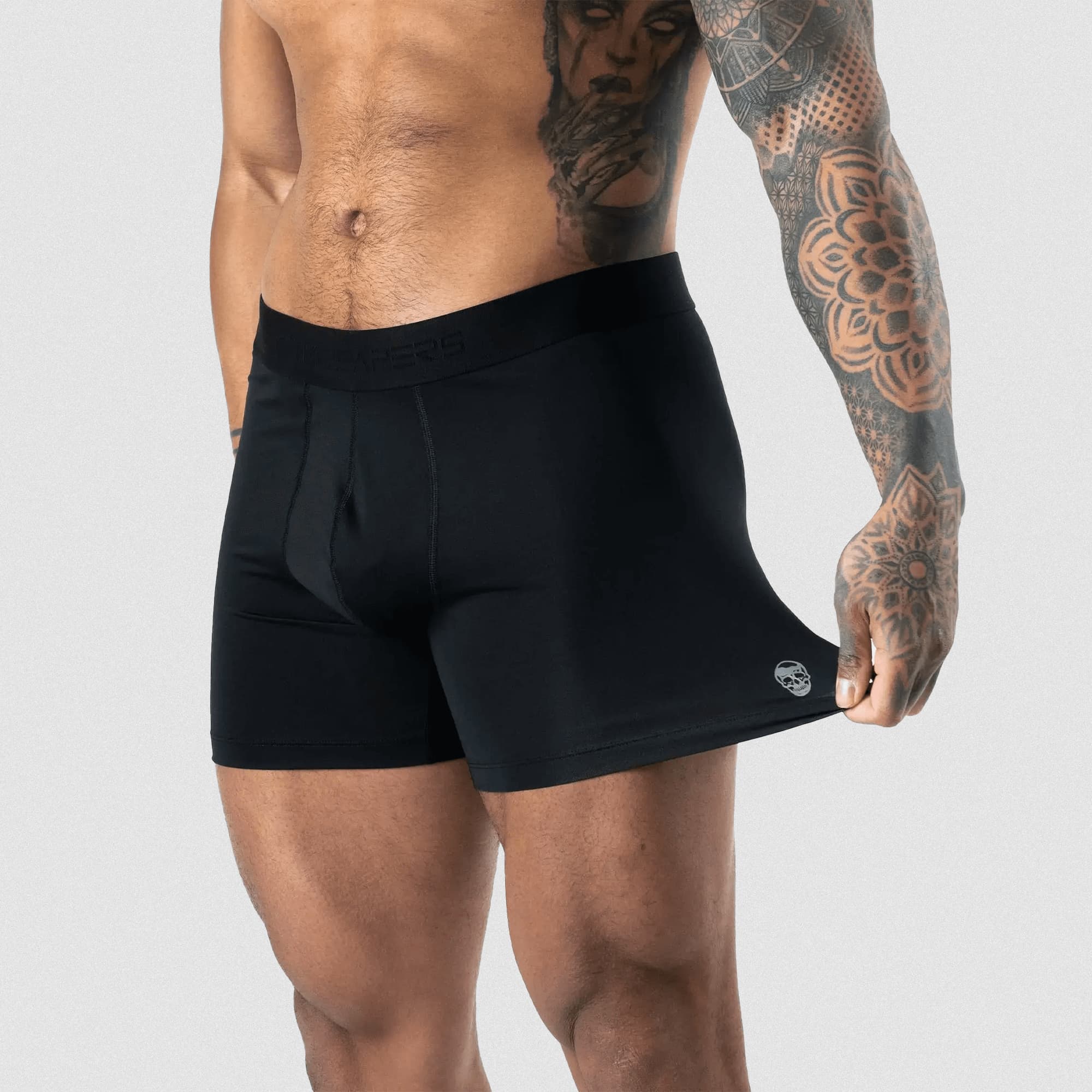 athlete wearing the momentum boxer briefs showcasing the stretch in the material