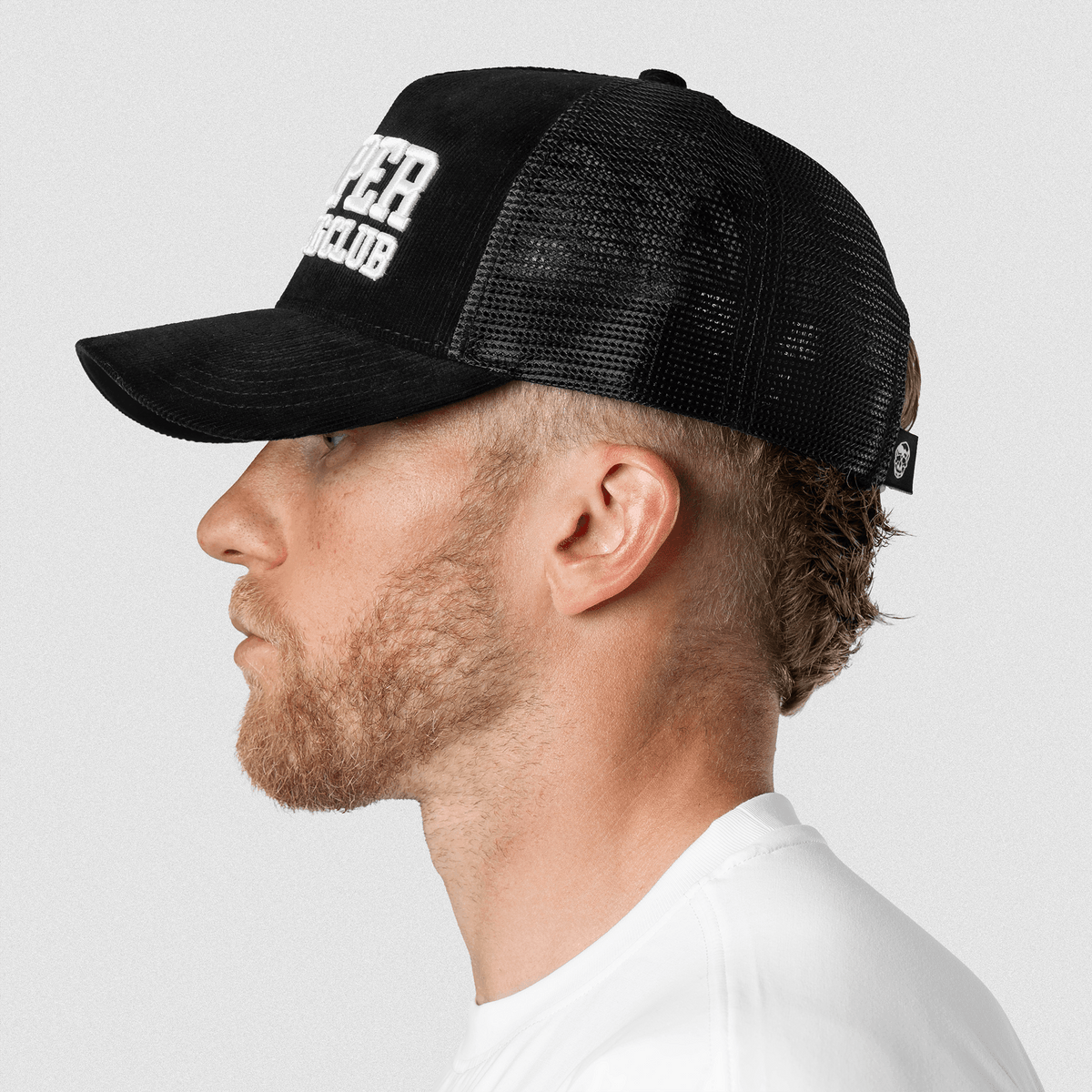 5-Panel Corduroy Reaper Training Club Hat in Black/White – On Model, Side View 2
