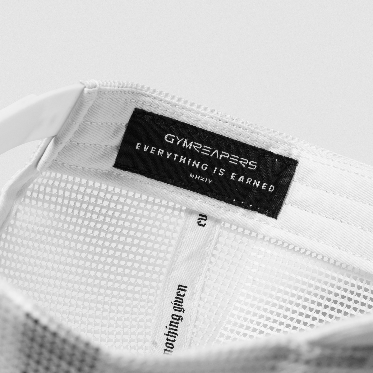 5-Panel Corduroy Reaper Training Club Hat in White/Black – Inside Tag Detail