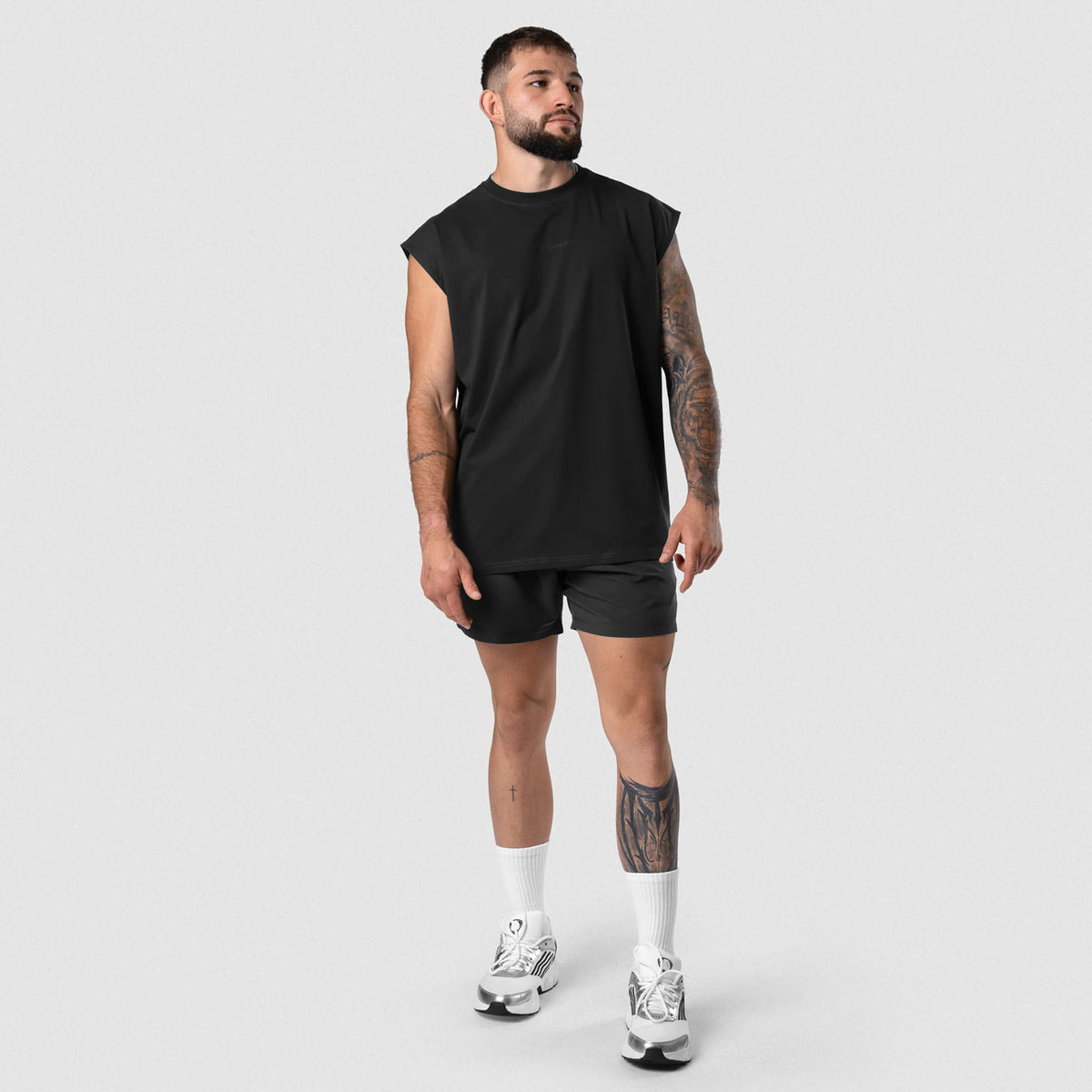 Men wearing Axis Cap Sleeve Tank - Black/Black full-body view
