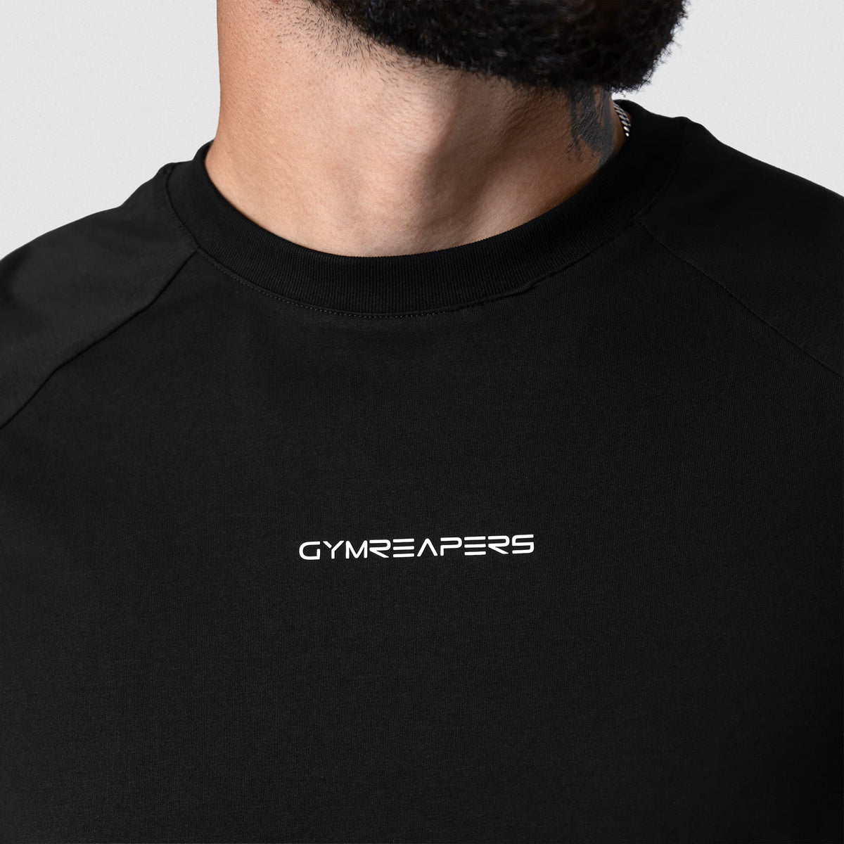 Axis Raglan Tee - Black/White neckline and chest logo detail
