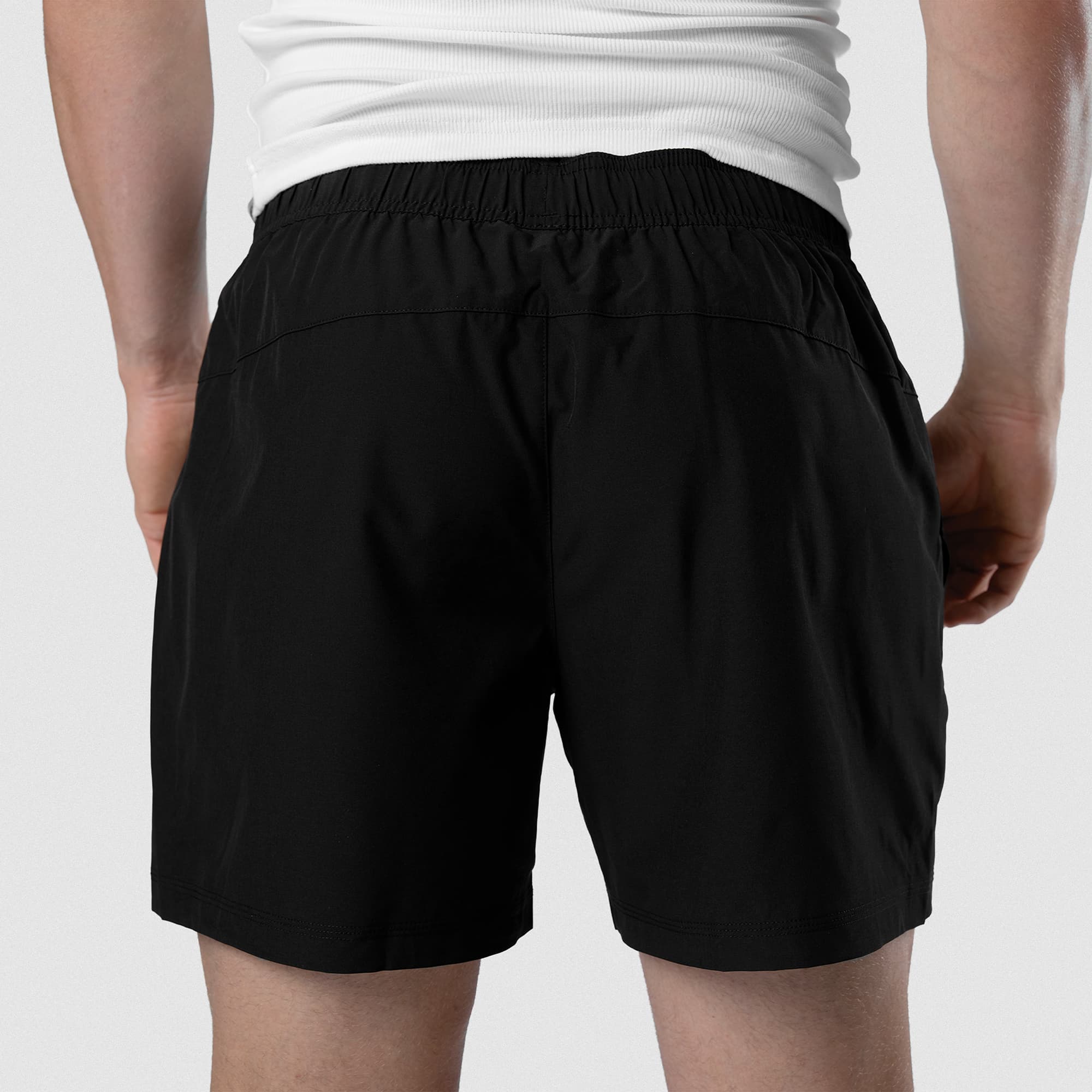 Back view of Men's Conquer 5 Inch Shorts on model - Black