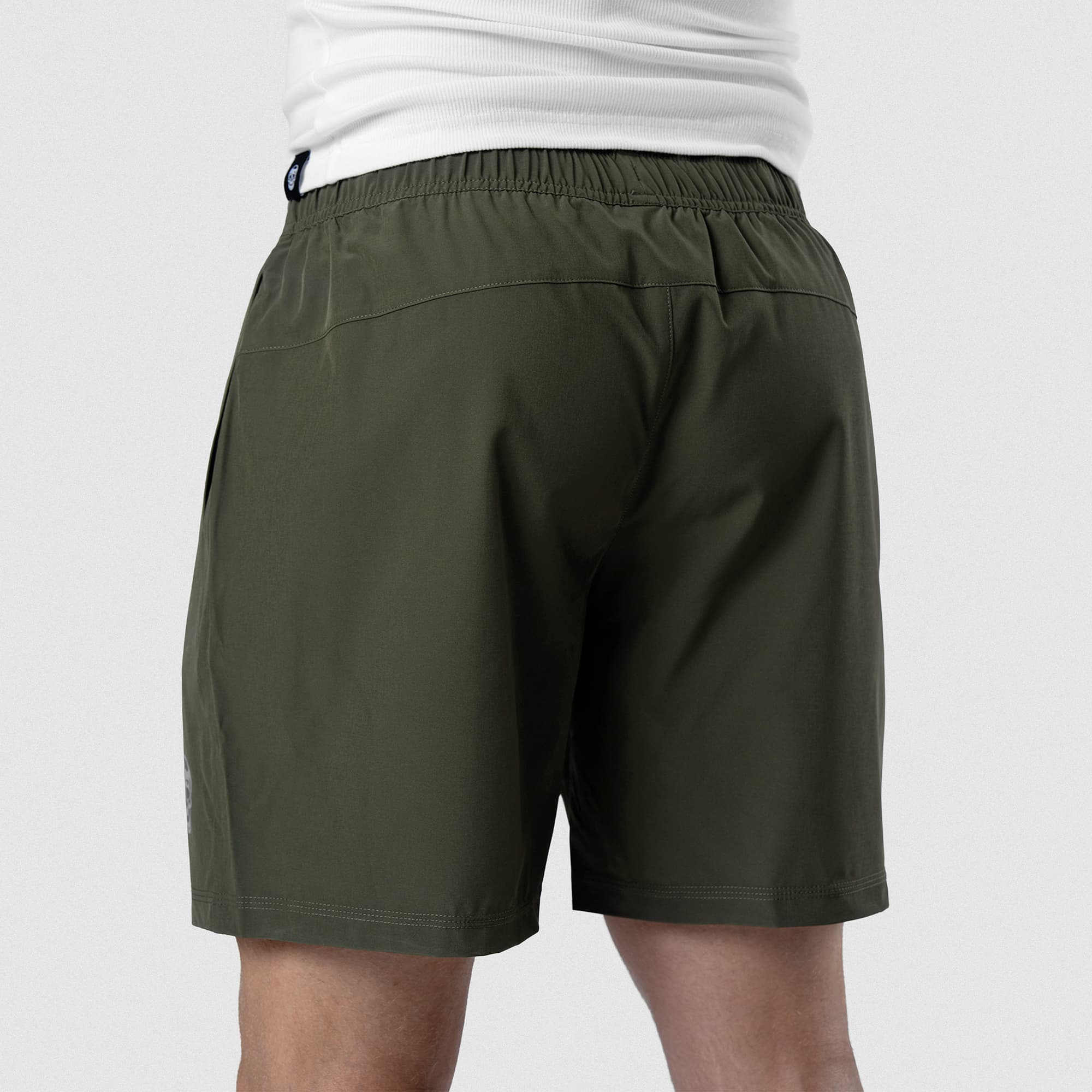 Back view of Men's Conquer 7 Inch Shorts on model - OD Green