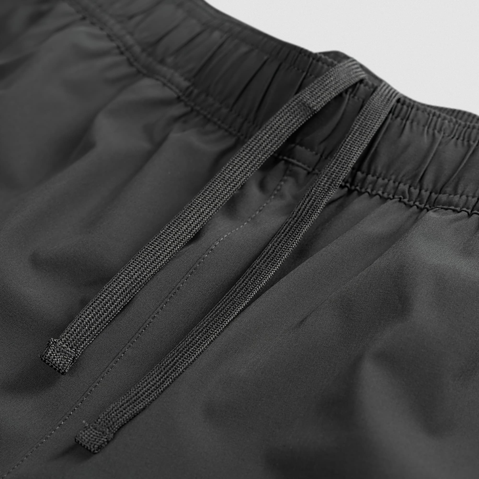 Stretch woven fabric detail on Men's Conquer 7 Inch Shorts - Dark Gray
