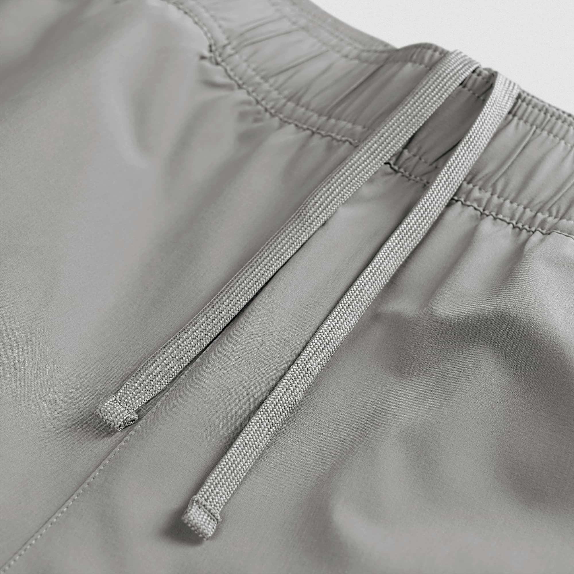 Stretch woven fabric detail on Men's Conquer 9 Inch Shorts - Gray