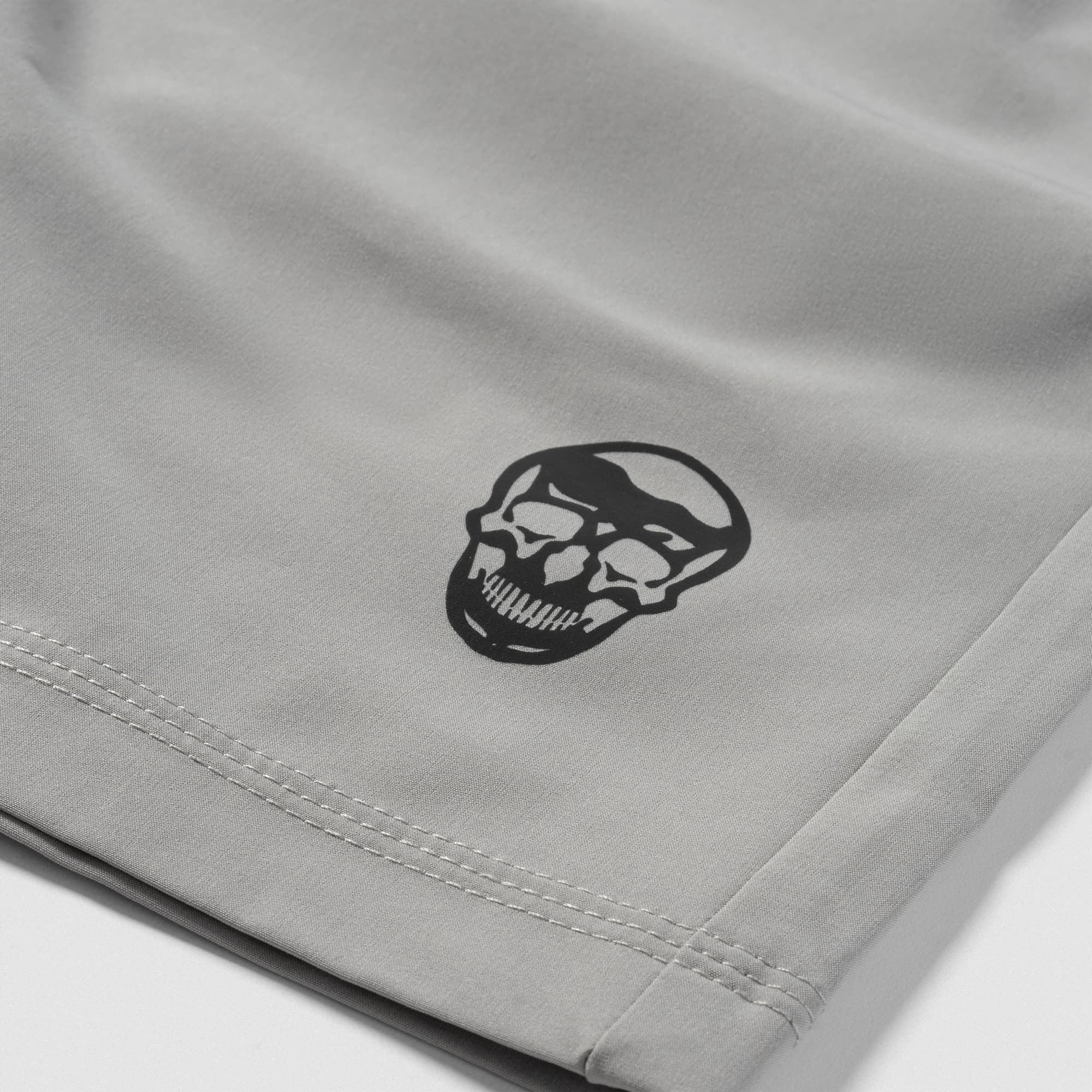 Reflective Gymreapers skull logo detail on Men's Conquer 9 Inch Shorts - Gray