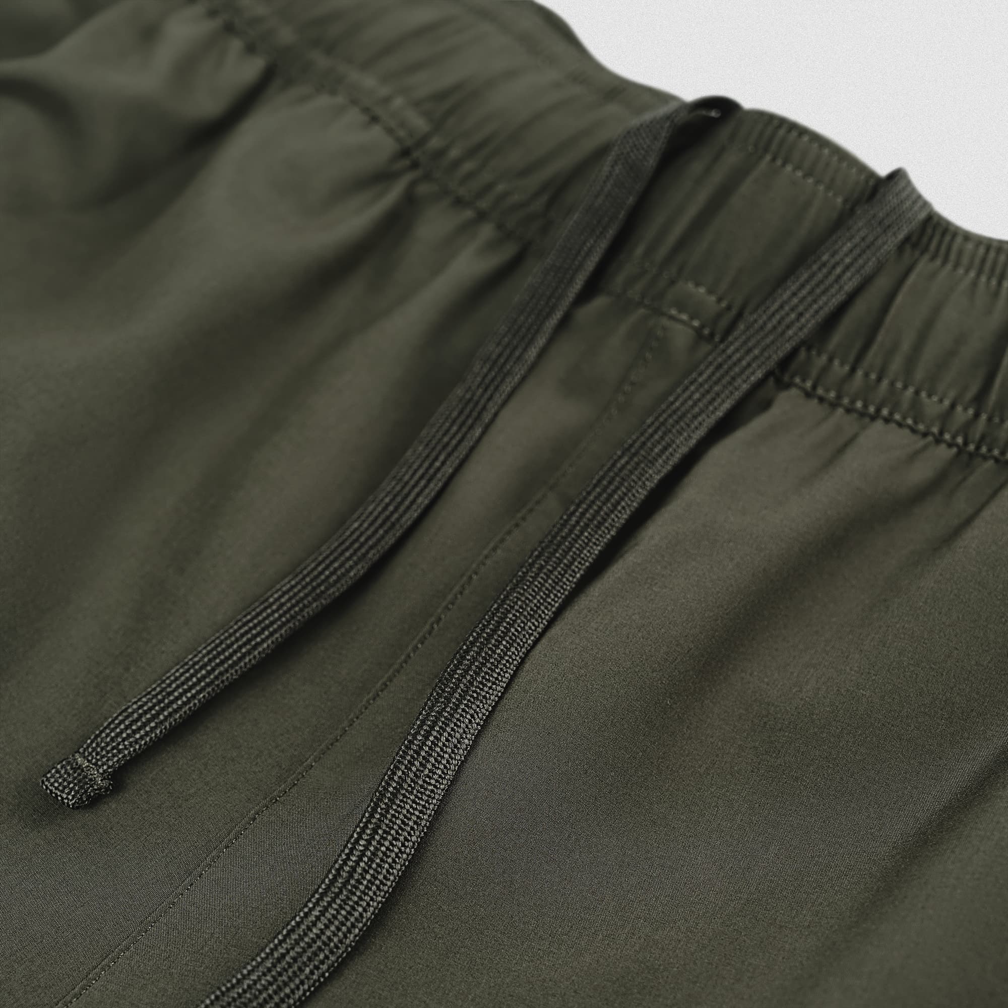 Stretch woven fabric detail on Men's Conquer 7 Inch Shorts - OD Green
