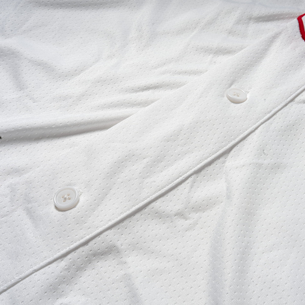 Olympia Americana Jersey | button detailing for full button closure