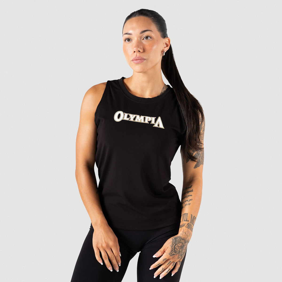 Model wearing the women's Champions Gold Full Length Training Tank