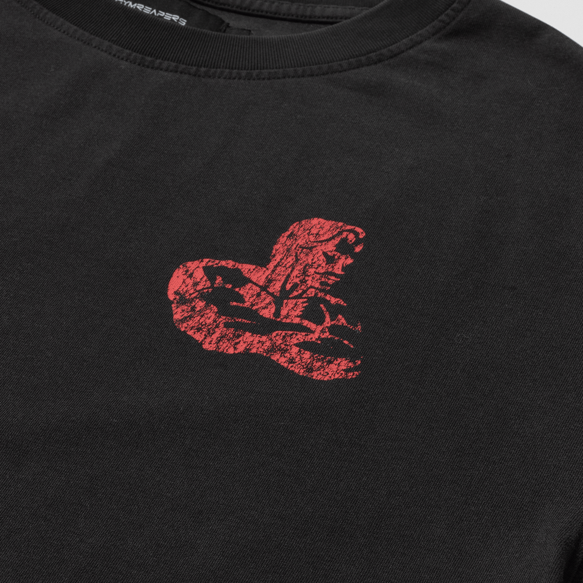Chest Logo Detail (Close-Up)