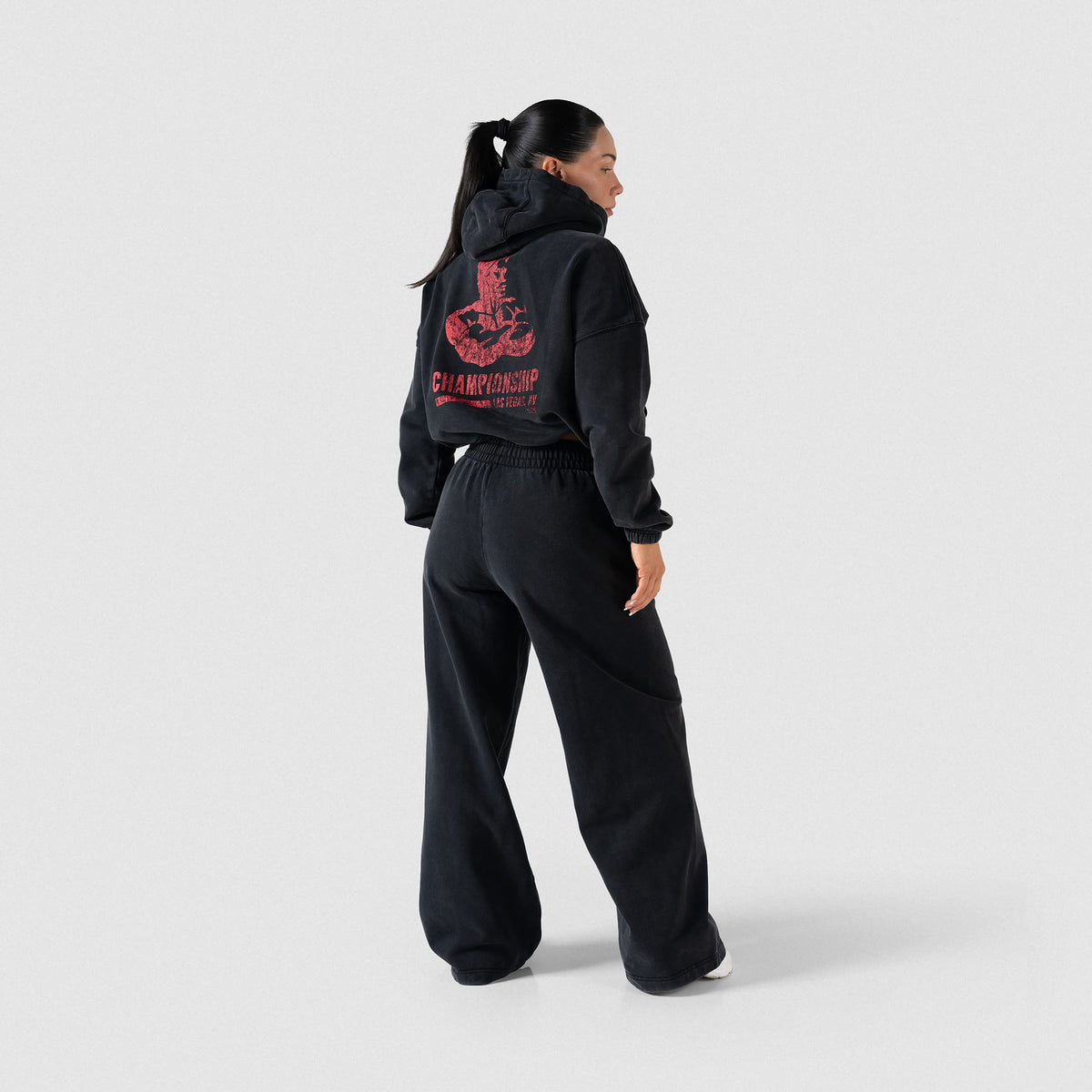 Full back view of the women's Championship Wide-Leg Jogger, paired with a black hoodie