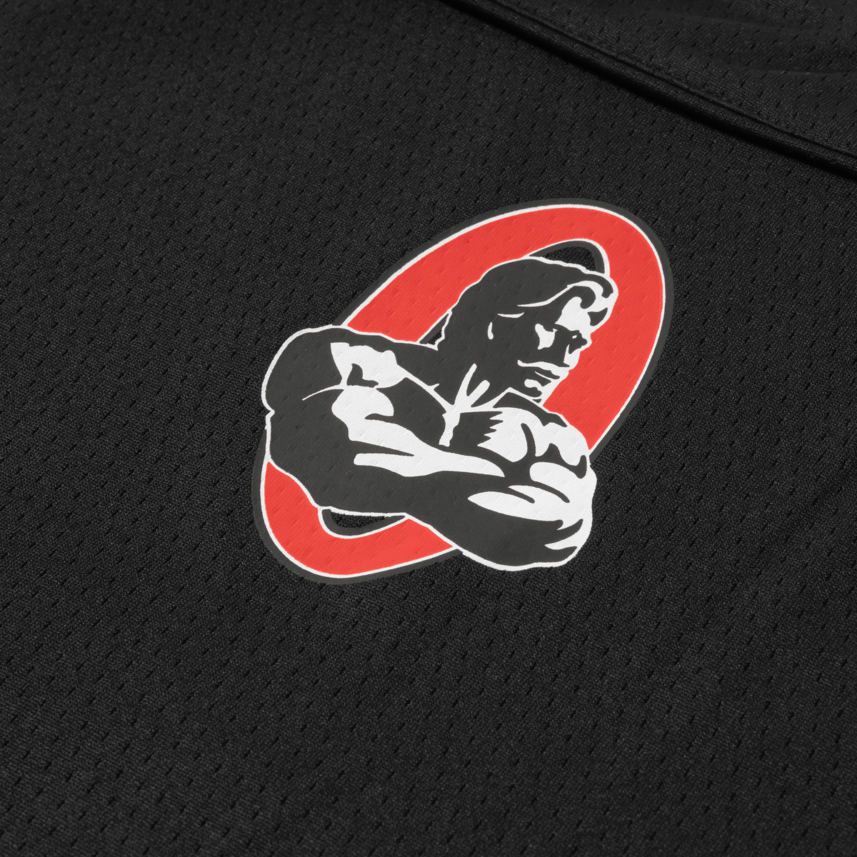 "O" Logo Patch Detail (Close-Up)