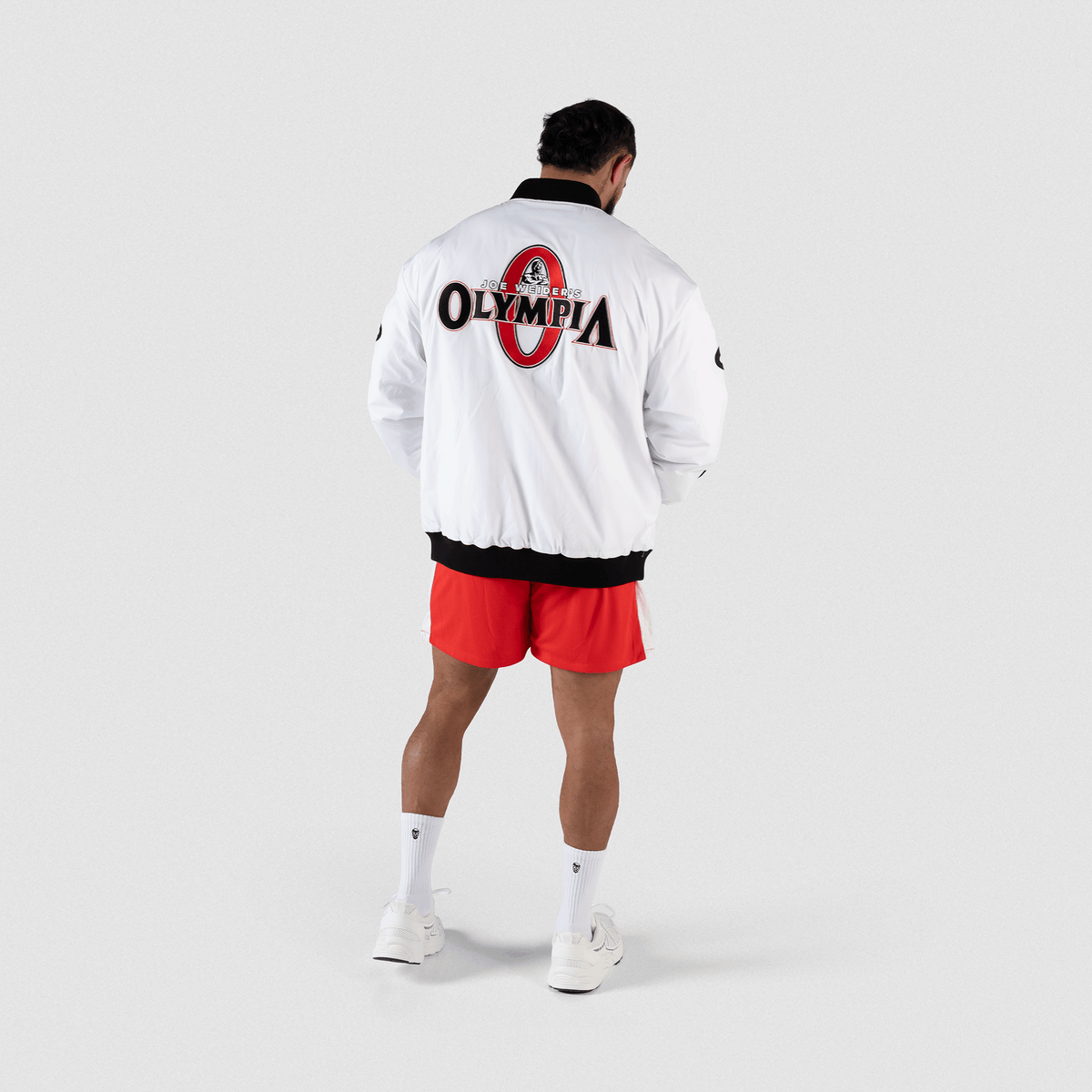 9. Olympia Signature Bomber Jacket in White – On Model, Side View

