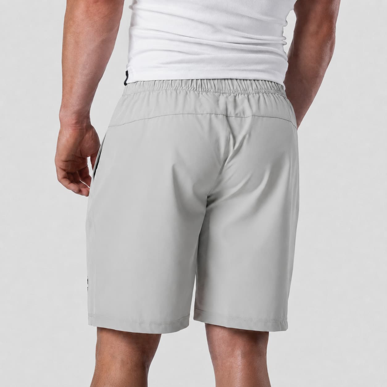 Back view of Men's Conquer 9 Inch Shorts on model - Gray