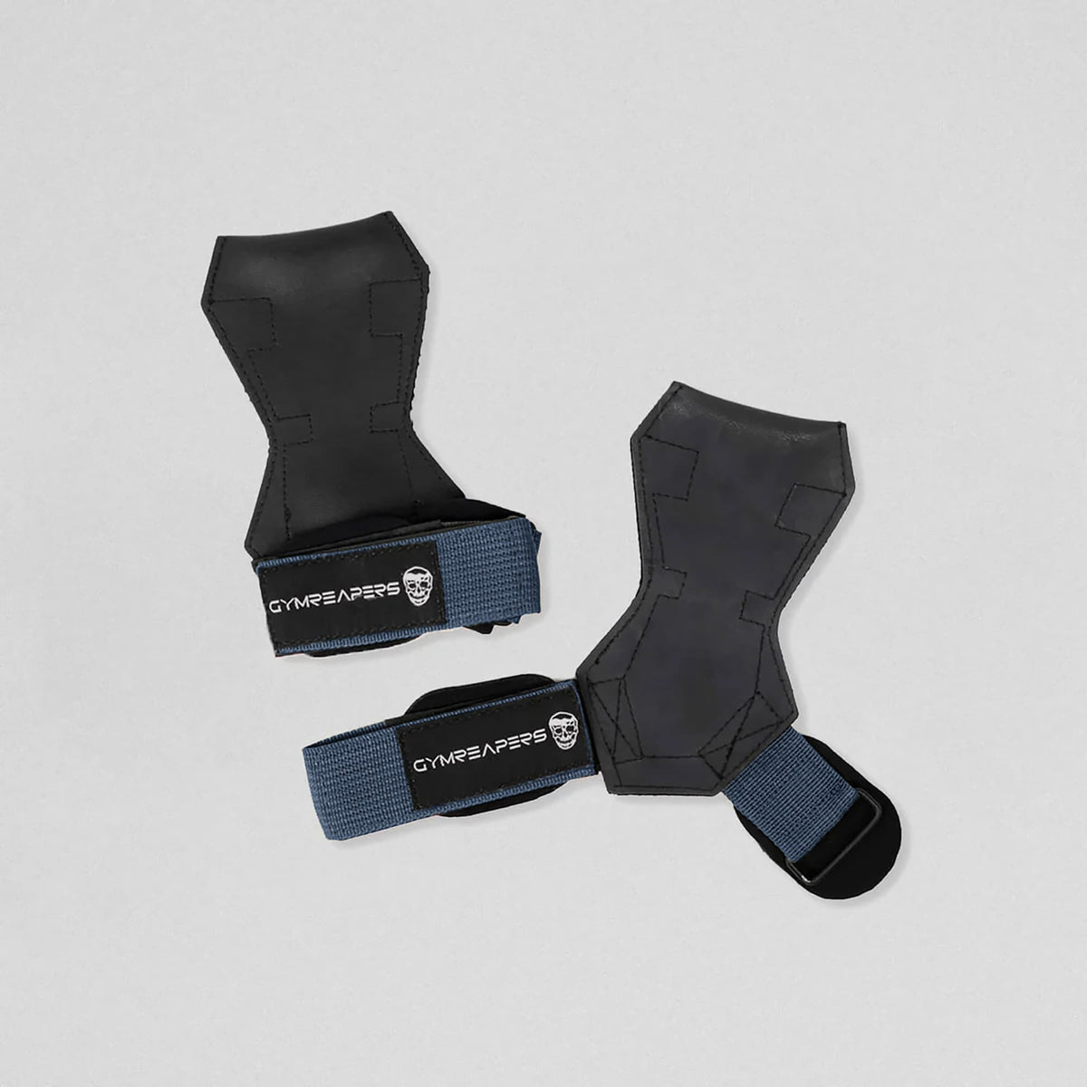 Gymreapers lifting grips navy one strap closed and the other laying flat and open.