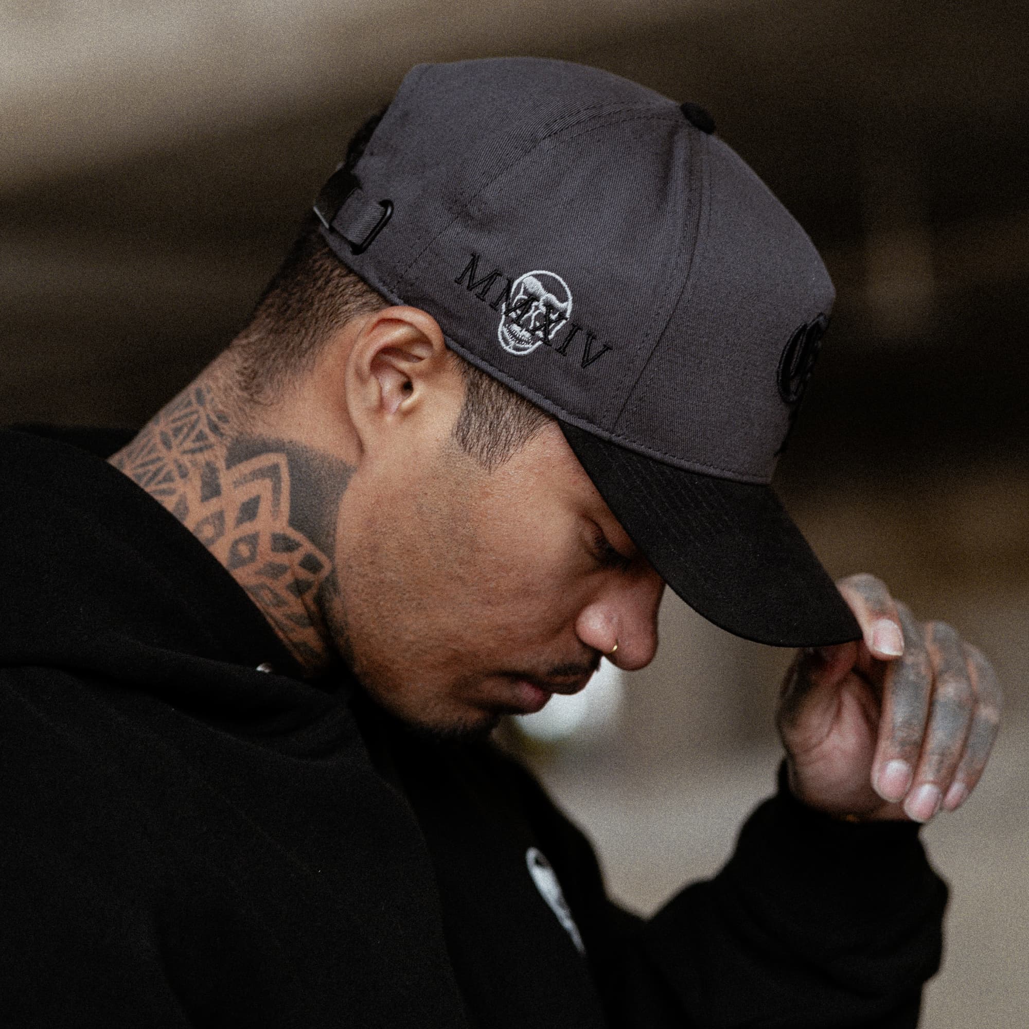 lifestyle shot of athlete wearing the initial suede hat side view