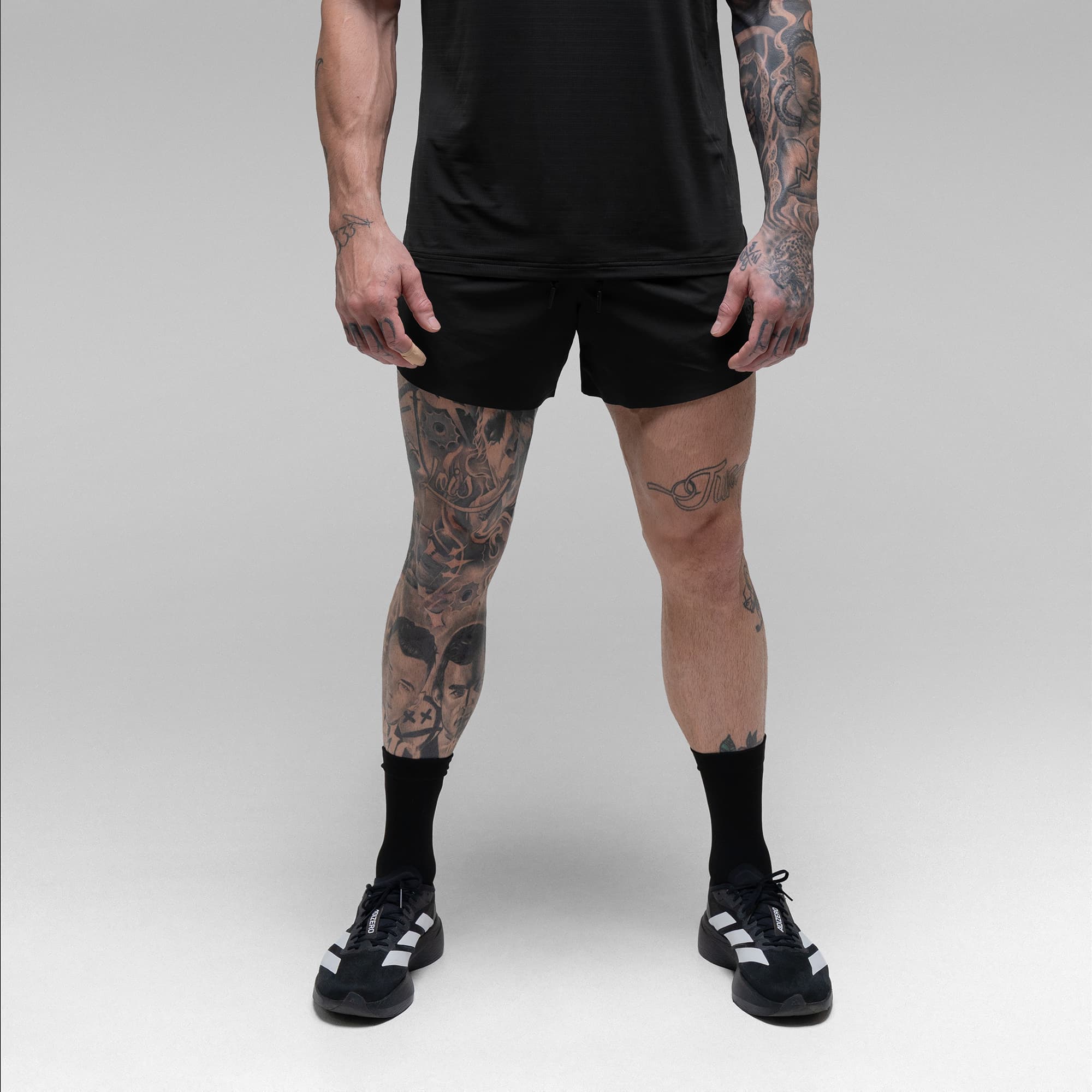 Athlete wearing the Ghost 5" Run Shorts half body shot front view