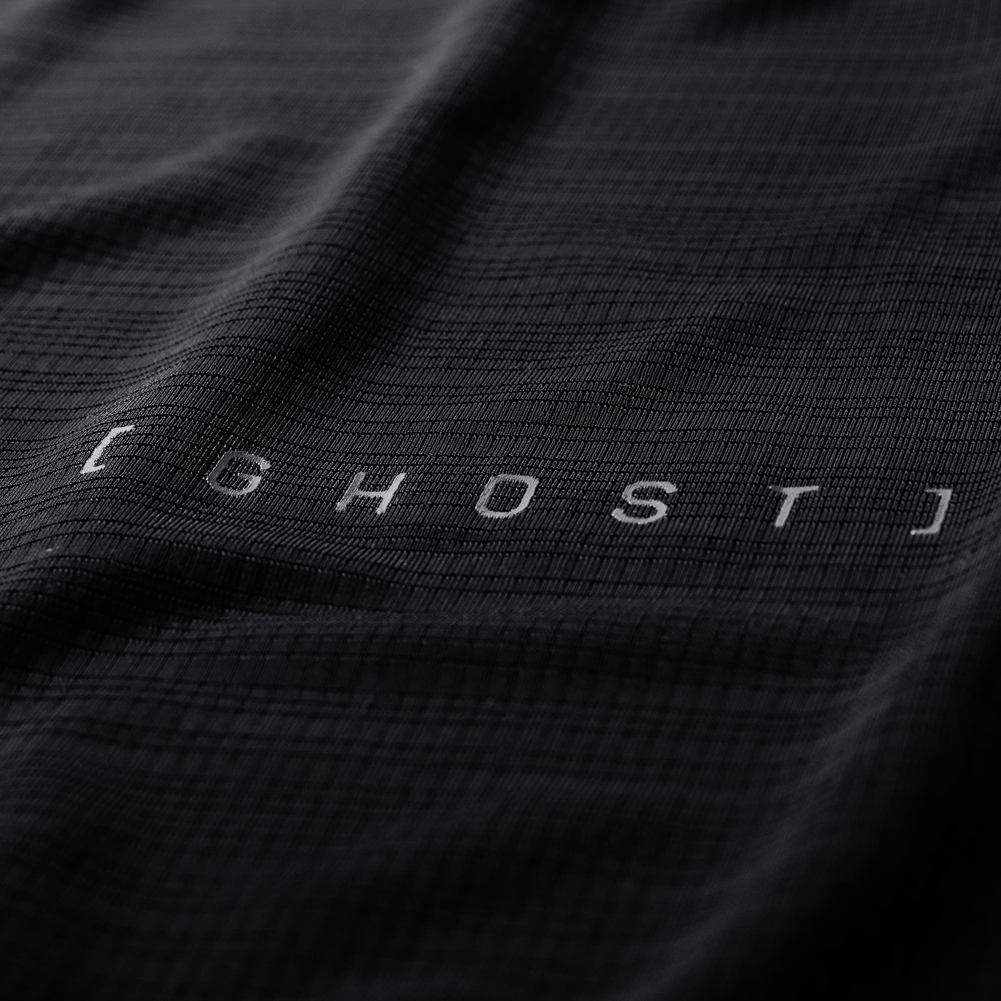 Ghost Racer Tank close up detail shot of fabric and logo