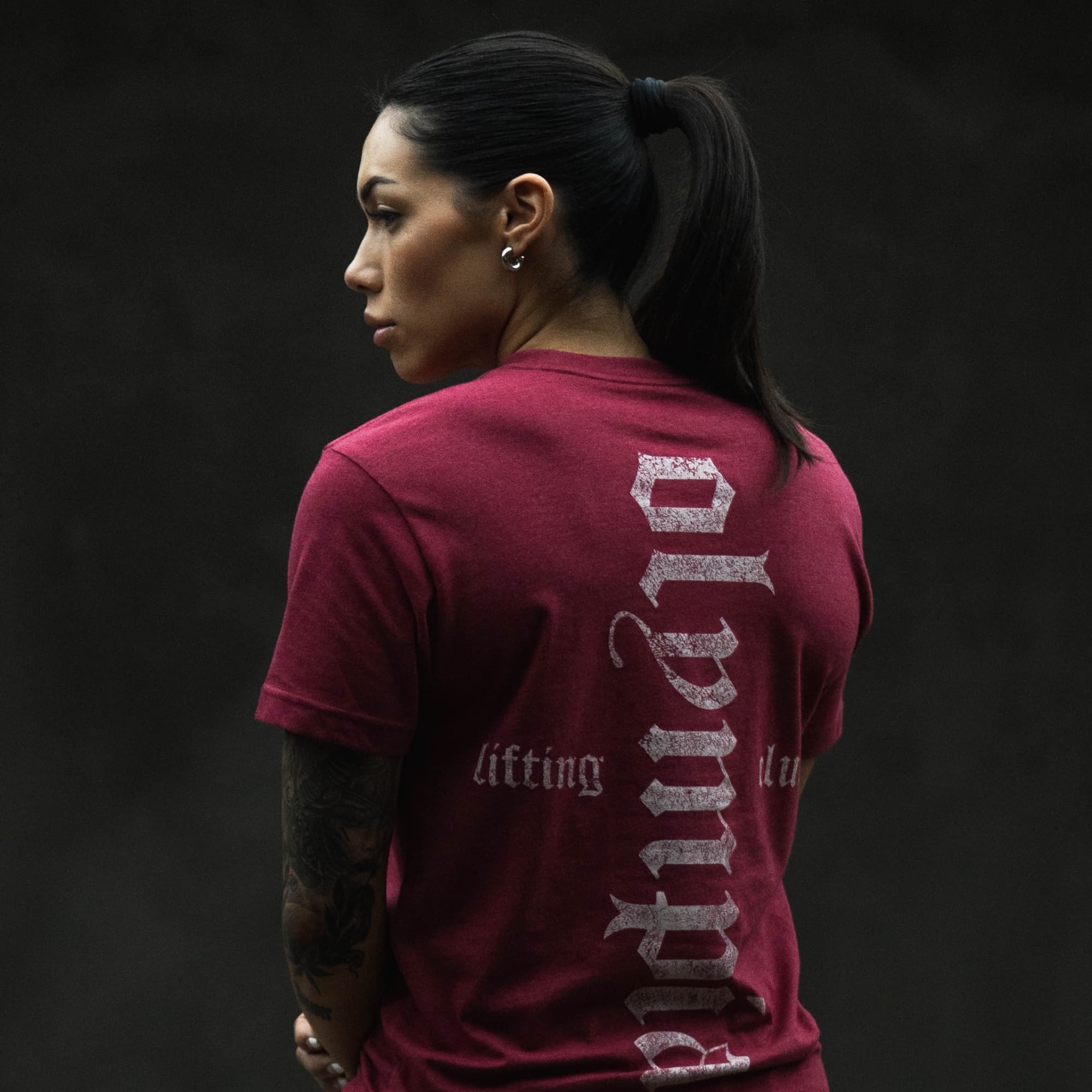 athlete wearing the olympia lifting club tee showcasing back graphic