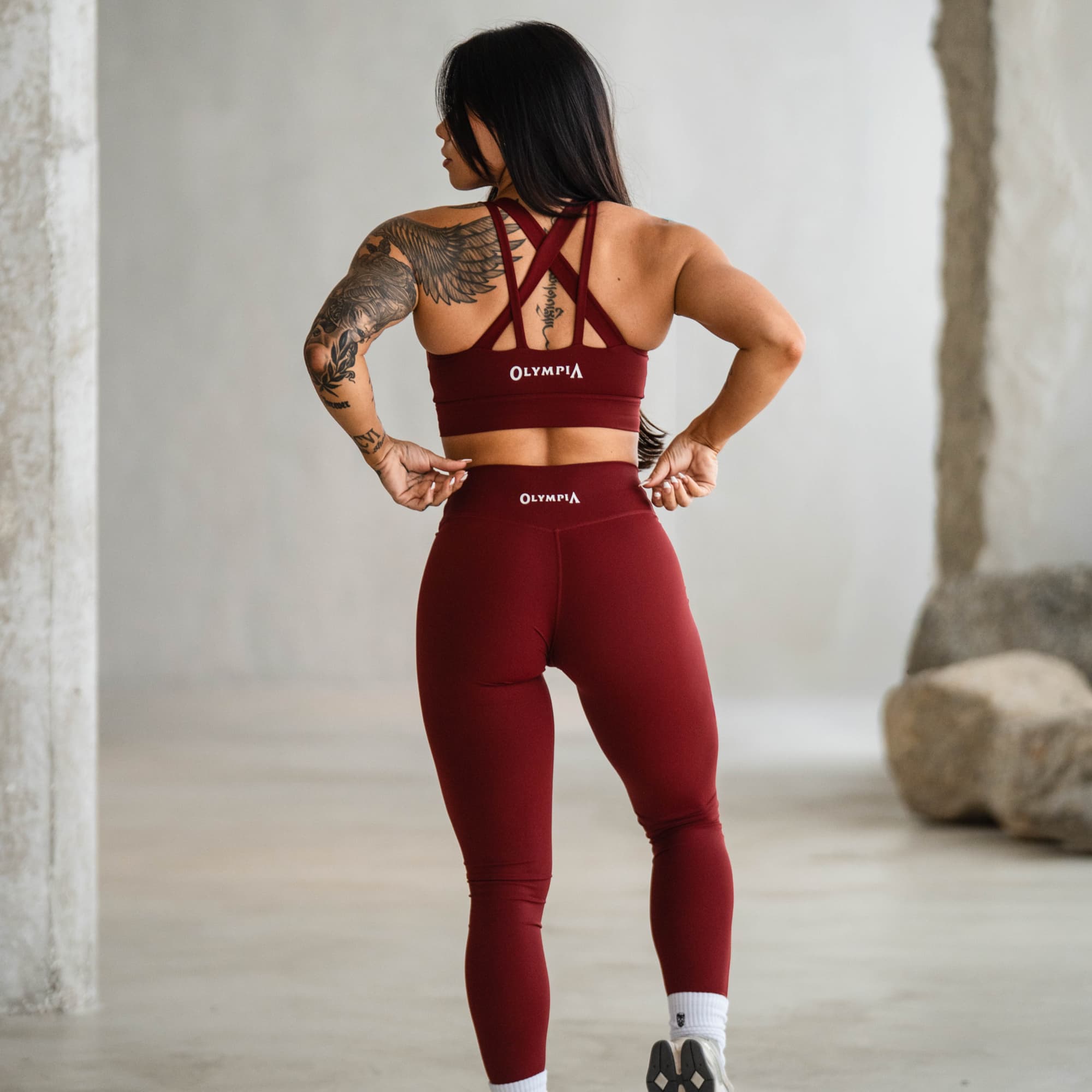 Back view of model wearing Olympia Training Leggings and matching bra.