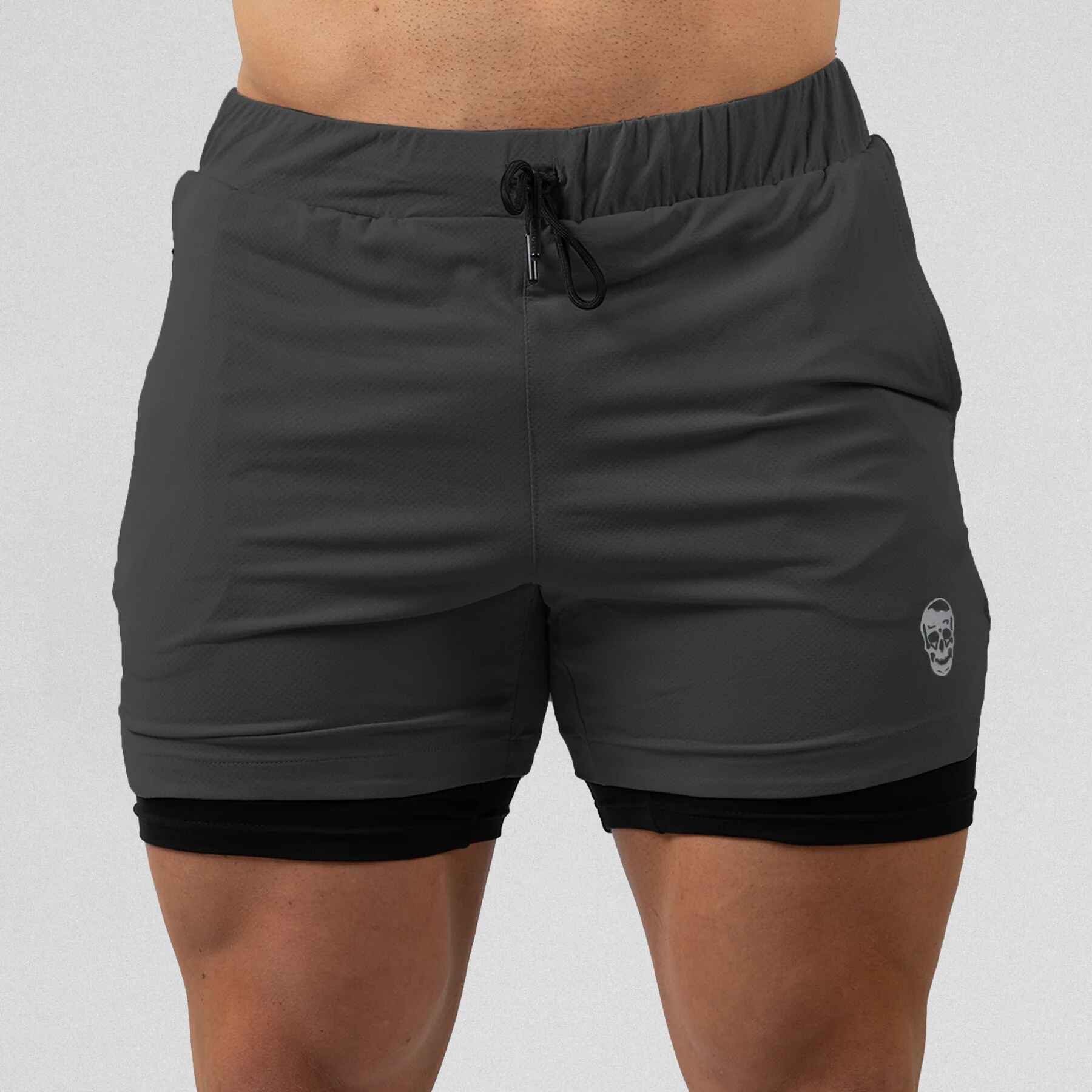 Gymreapers react training shorts Gray color way on athlete showcasing the front.
