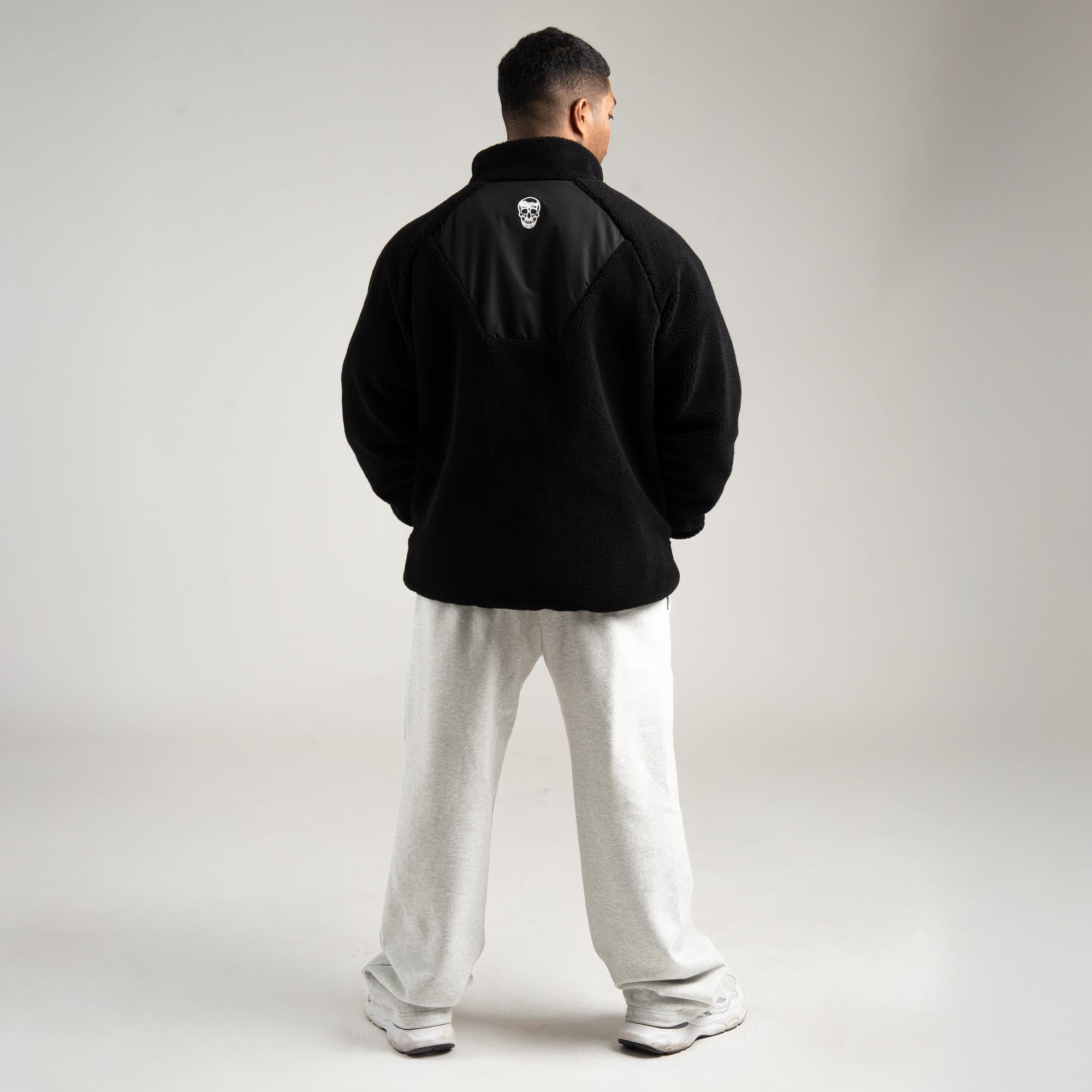 Athlete wearing Sektor Sherpa Jacket full body shot back view