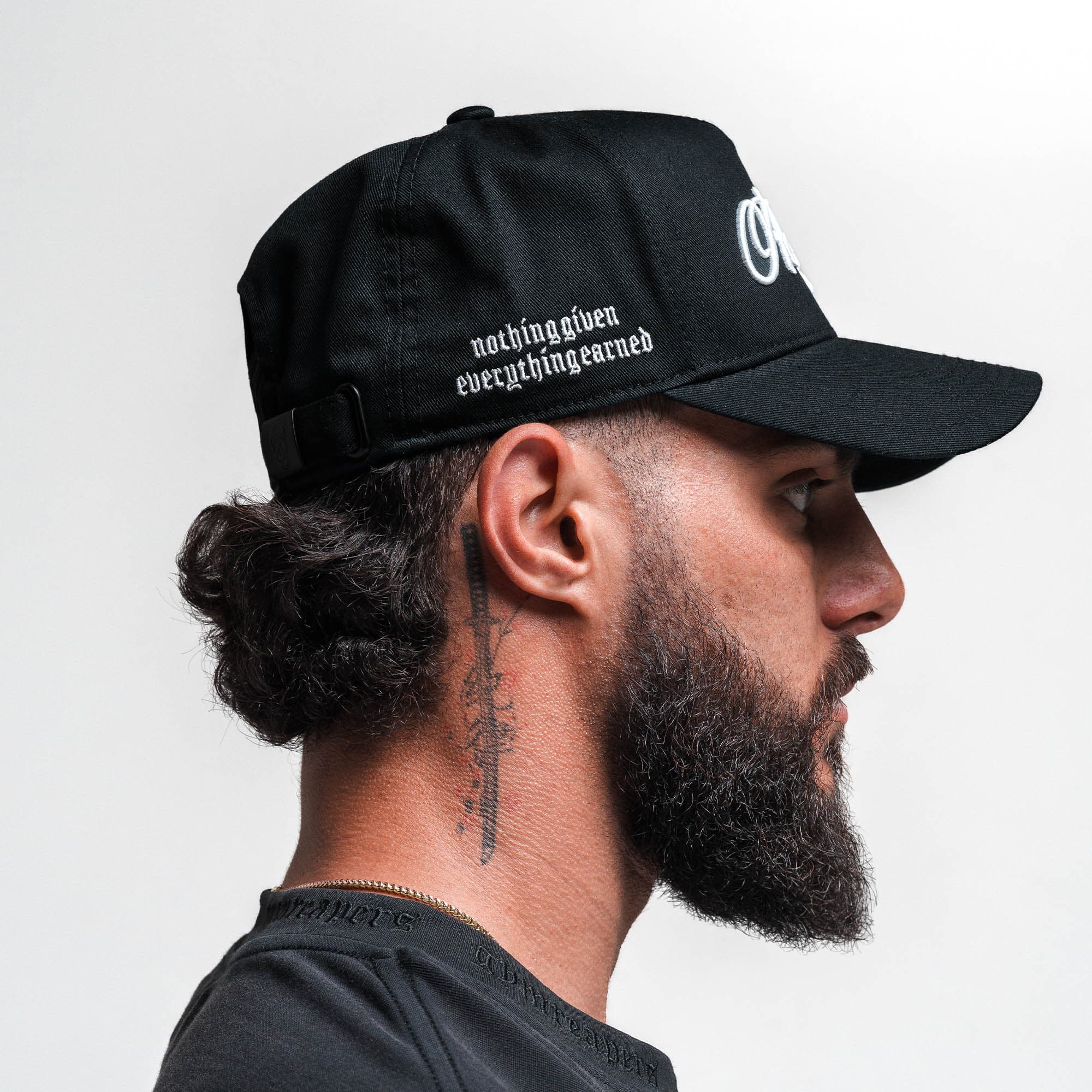 Athlete wearing Reapers 5-Panel Cotton Hat - Black/White side view