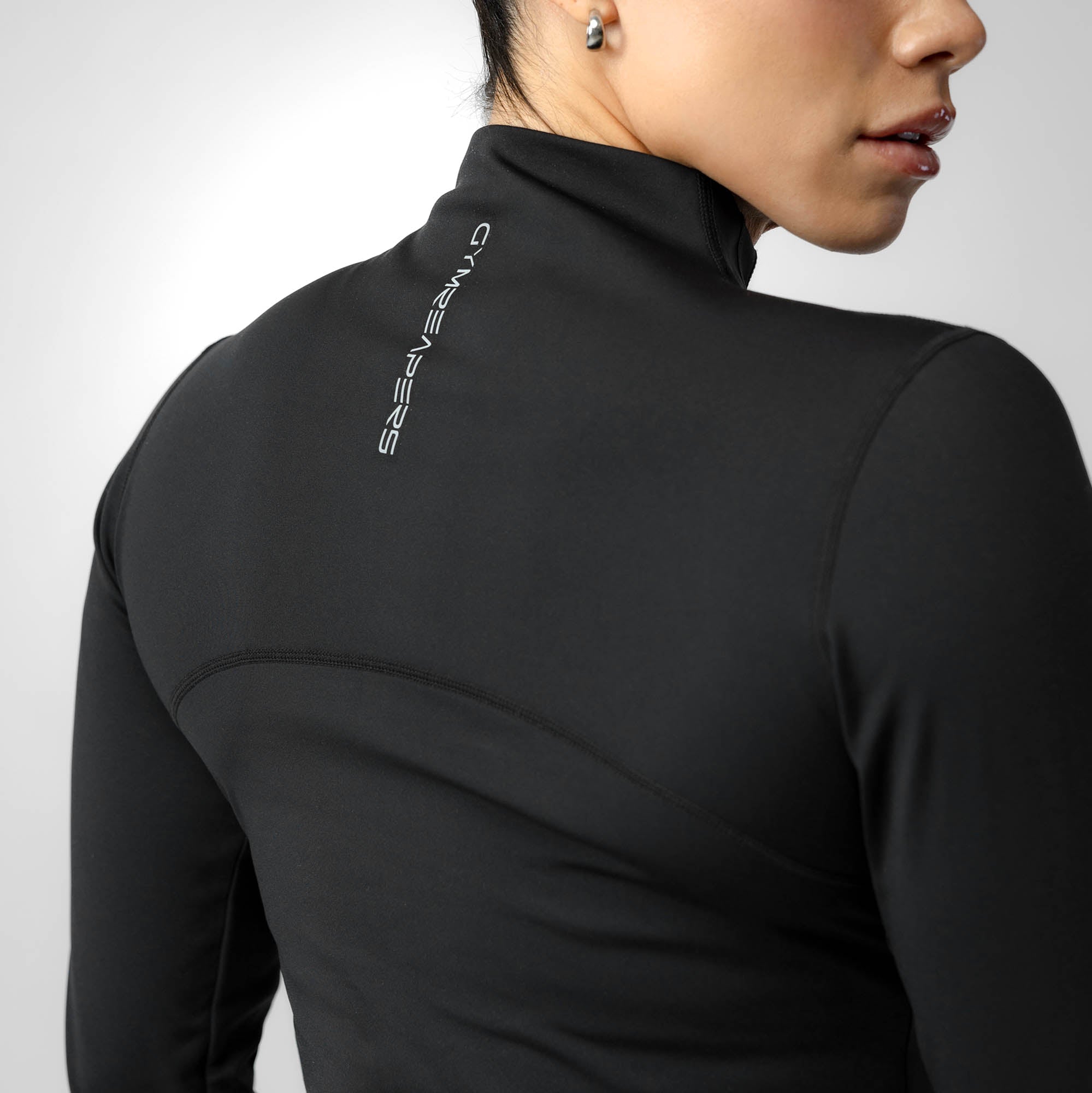 black performance running jacket back close up