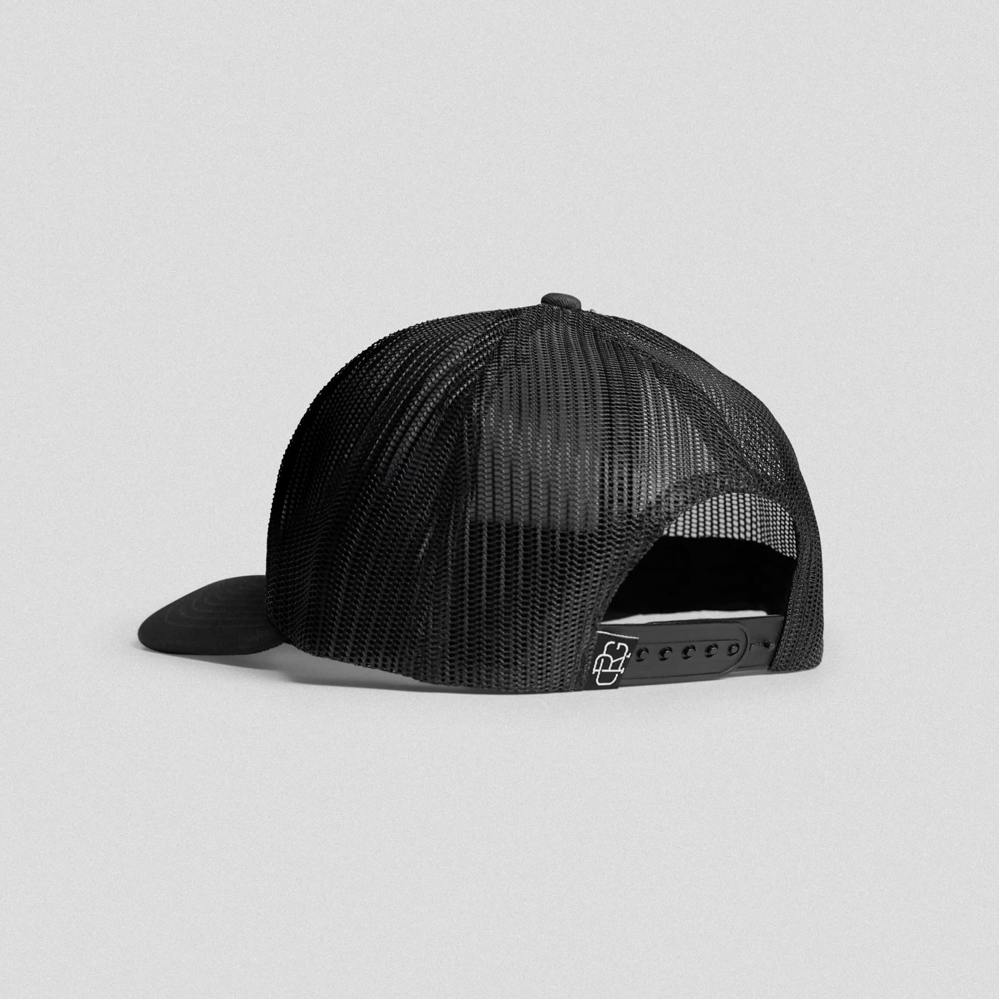 core trucker hat black white back