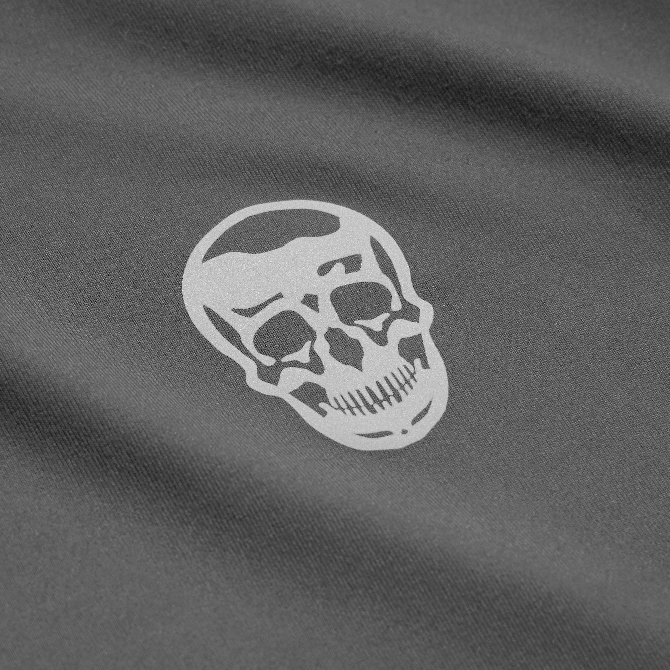 performance quarter zip steel skull close up