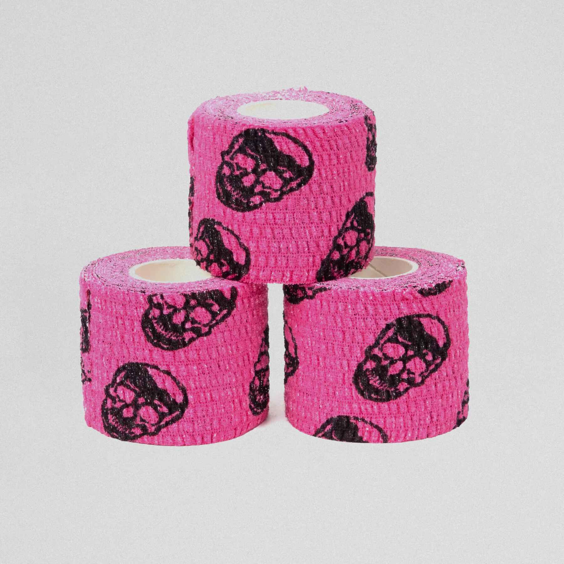 Three pieces of skull tape stacked on top of each other.