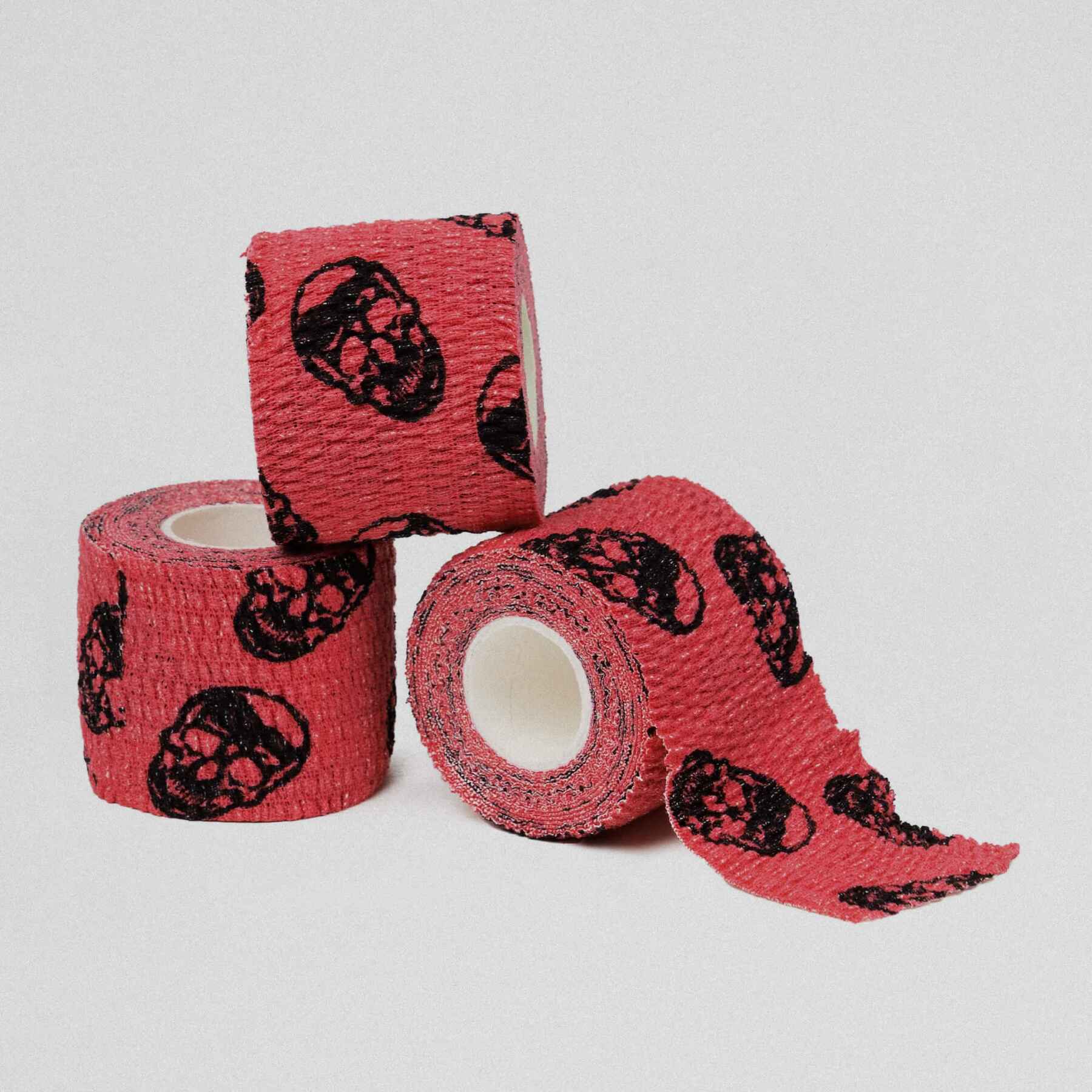 Gymreapers Skull Tape three rolls stacked.