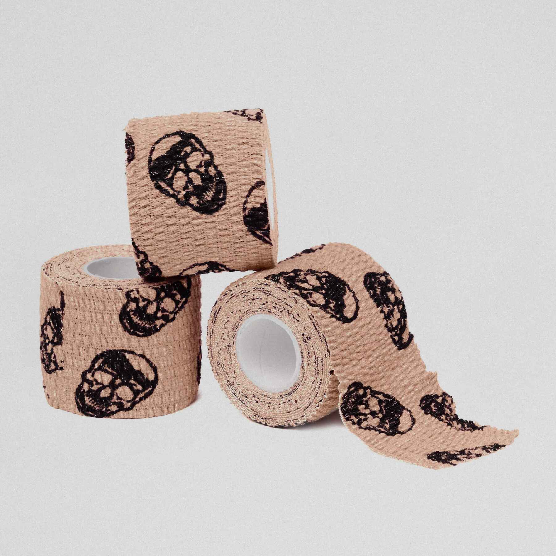 Gymreapers Skull Tape three rolls stacked.